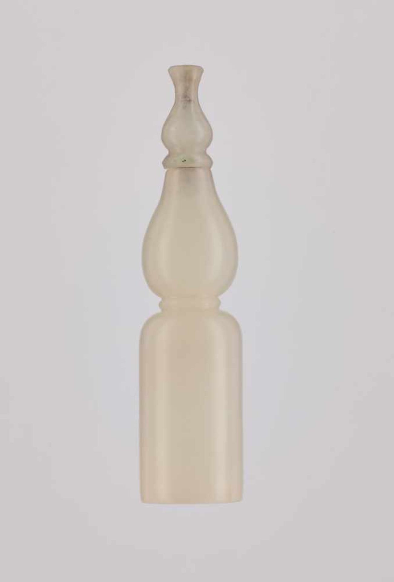 A WHITE JADE SNUFF BOTTLE, CONVERTED FROM A HOOKAH MOUTHPIECE Nephrite of even white color and - Image 2 of 7