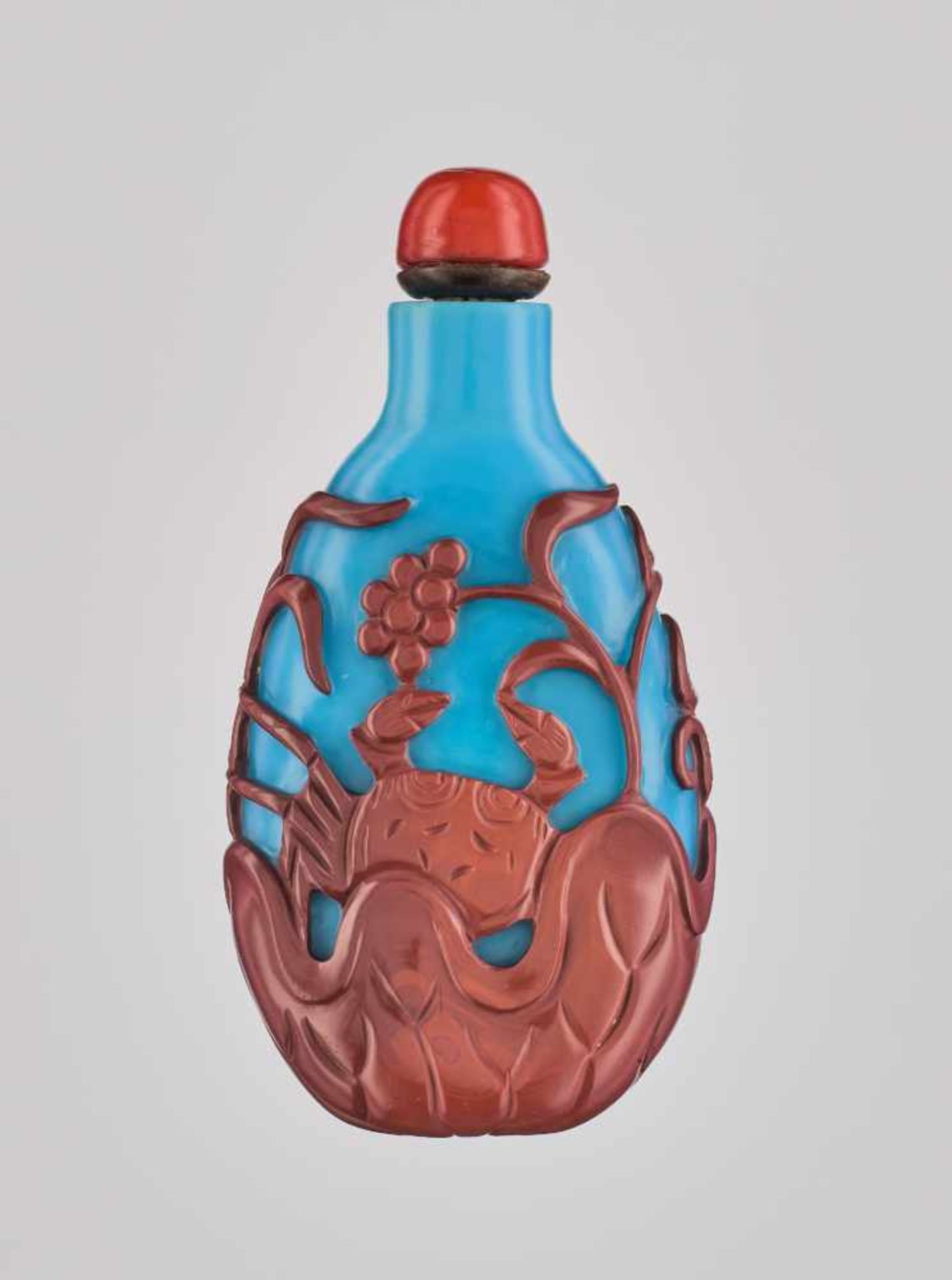 A CINNABAR-RED OVERLAY TURQUOISE-BLUE GLASS 'CRABS' SNUFF BOTTLE, QING DYNASTY Carved and neatly