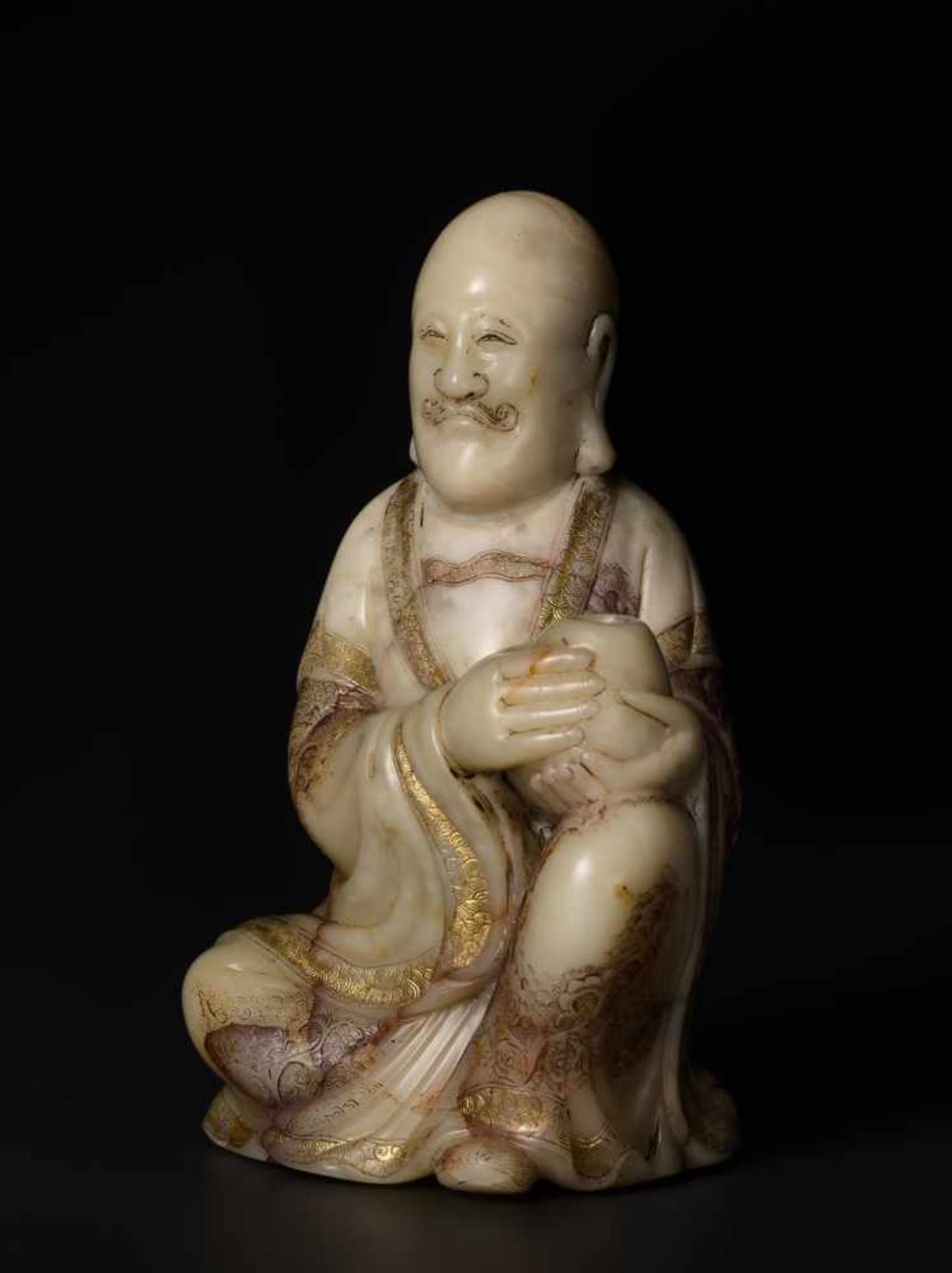 A FINE 17th / 18th CENTURY SOAPSTONE FIGURE OF A LUOHAN Soapstone of a creamy-beige color with