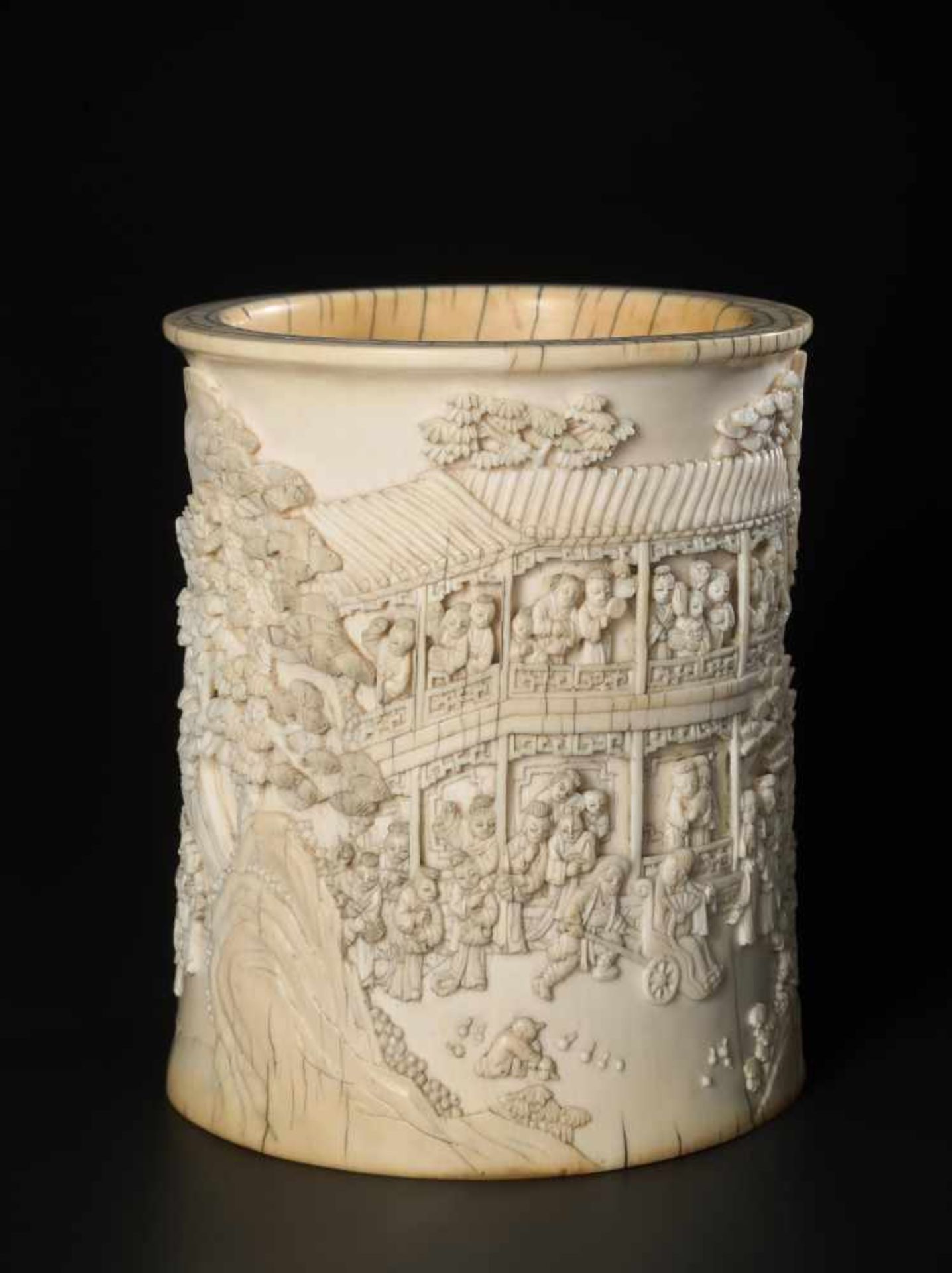 AN IMPERIAL 18TH CENTURY IVORY BITONG BRUSHPOT WITH THE STORY OF PAN YUE Ivory, wooden base China,