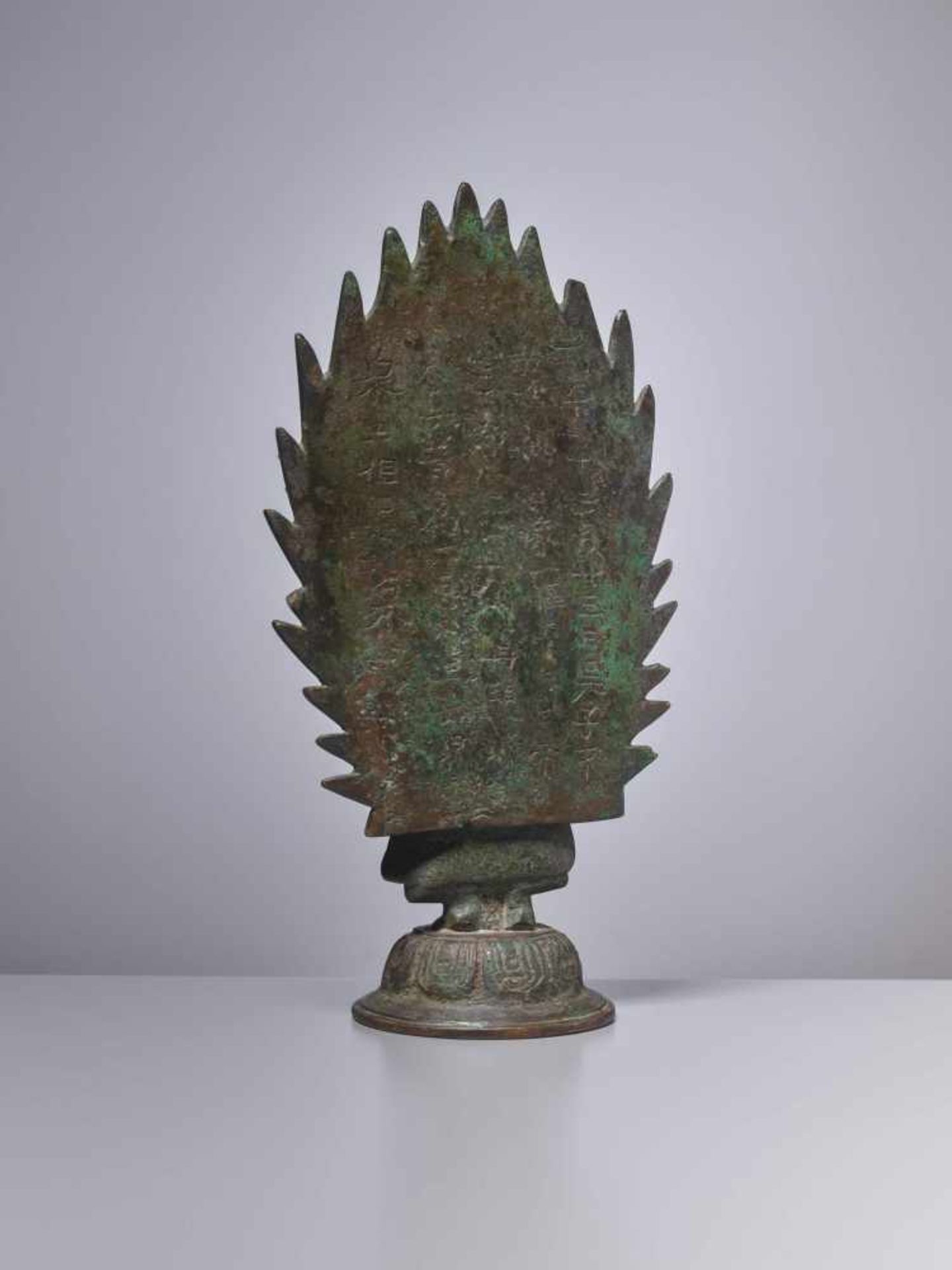 A BRONZE BUDDHA STANDING IN FRONT OF A FLAMING HALO, DATED 571 Cast and incised bronze with a rich - Image 5 of 7
