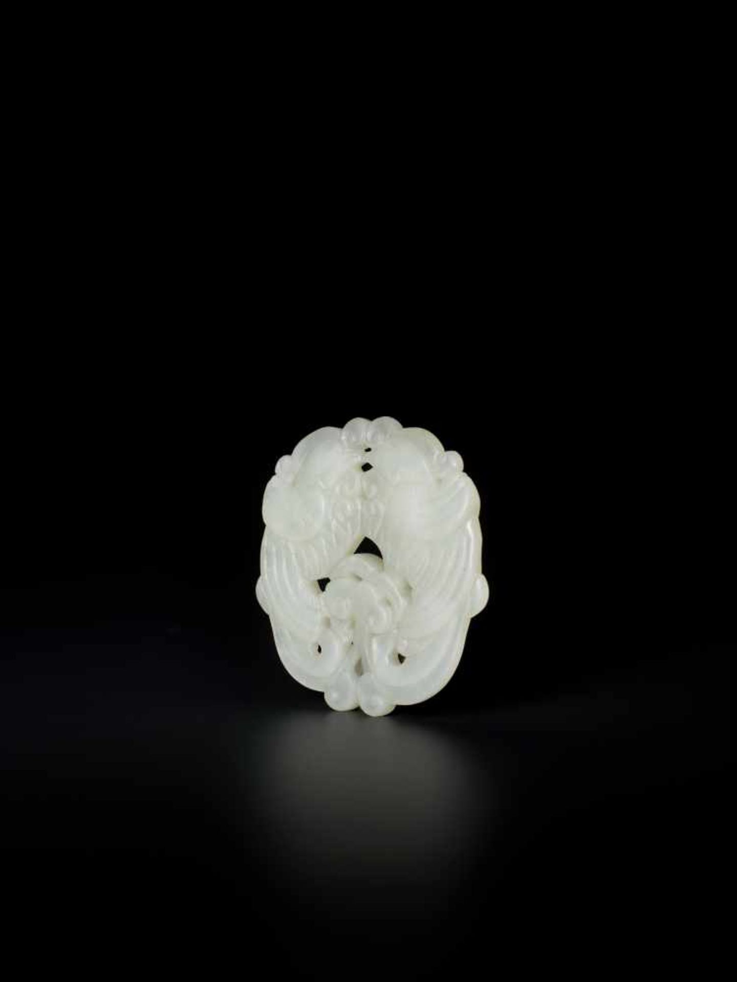 A WHITE JADE QING DYNASTY ‘DOUBLE PHOENIX’ PENDANT White color jade of an even tone, smooth - Image 3 of 5