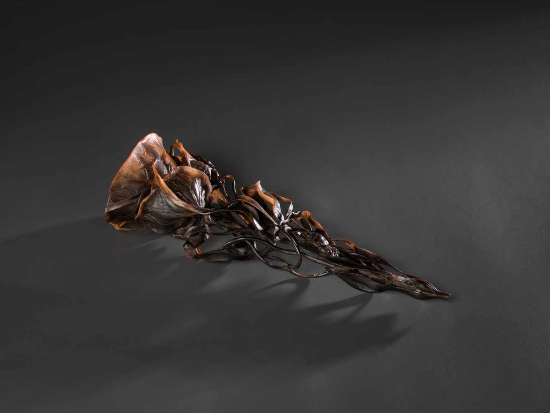 AN 18TH CENTURY RETICULATED FULL TIP RHINOCEROS ‘LOTUS’ CUP Rhinoceros horn in a deep brown to light - Image 6 of 9