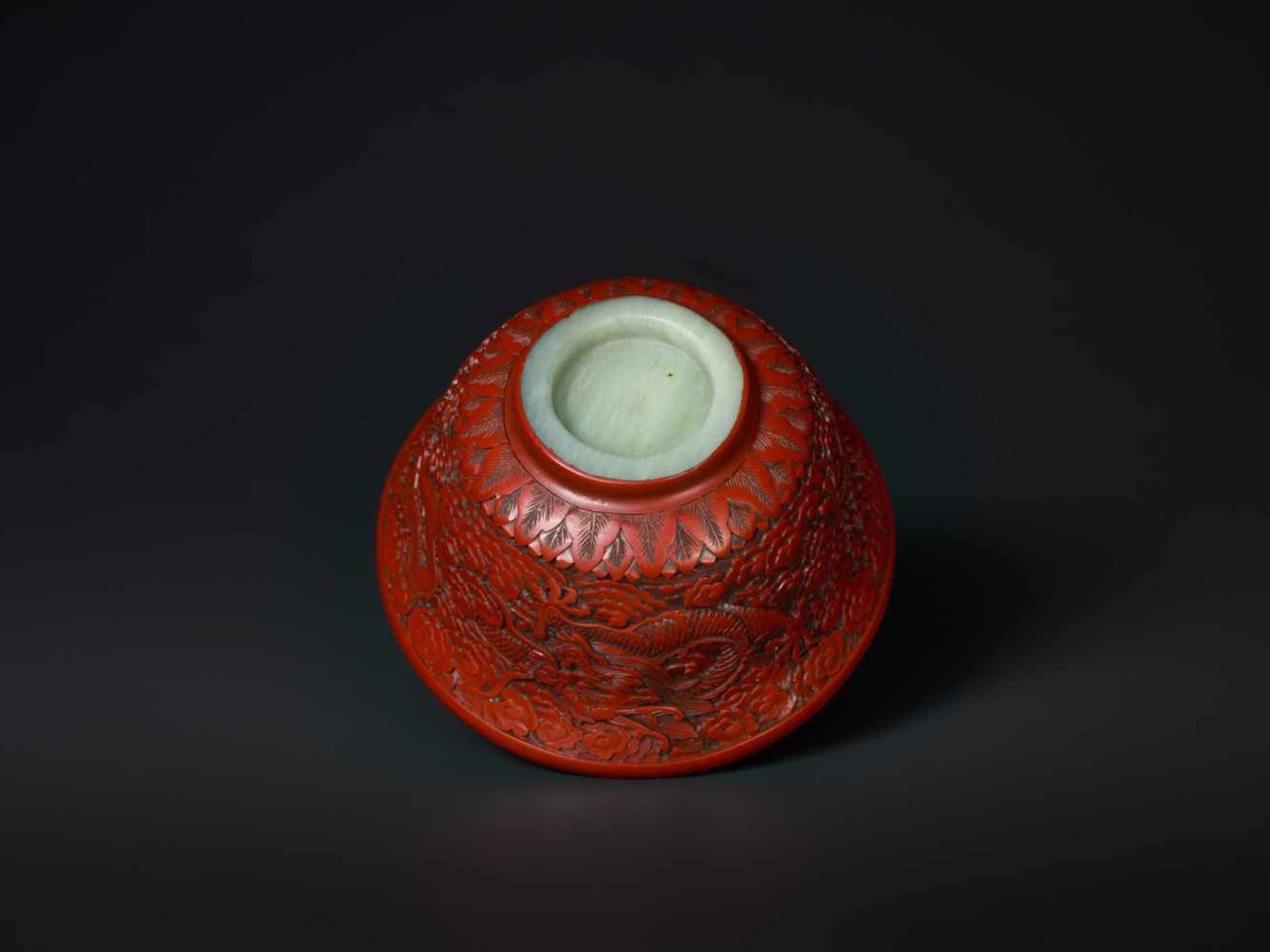 AN EXTREMELY RARE QIANLONG PERIOD CINNABAR LACQUER EMBELLISHED JADE BOWL Celadon and grey streaked - Image 3 of 7