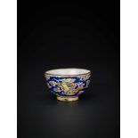 A QING DYNASTY CENTURY CANTON ENAMEL MINIATURE WINE CUP WITH DRAGON Enamel on bronze, multicolored