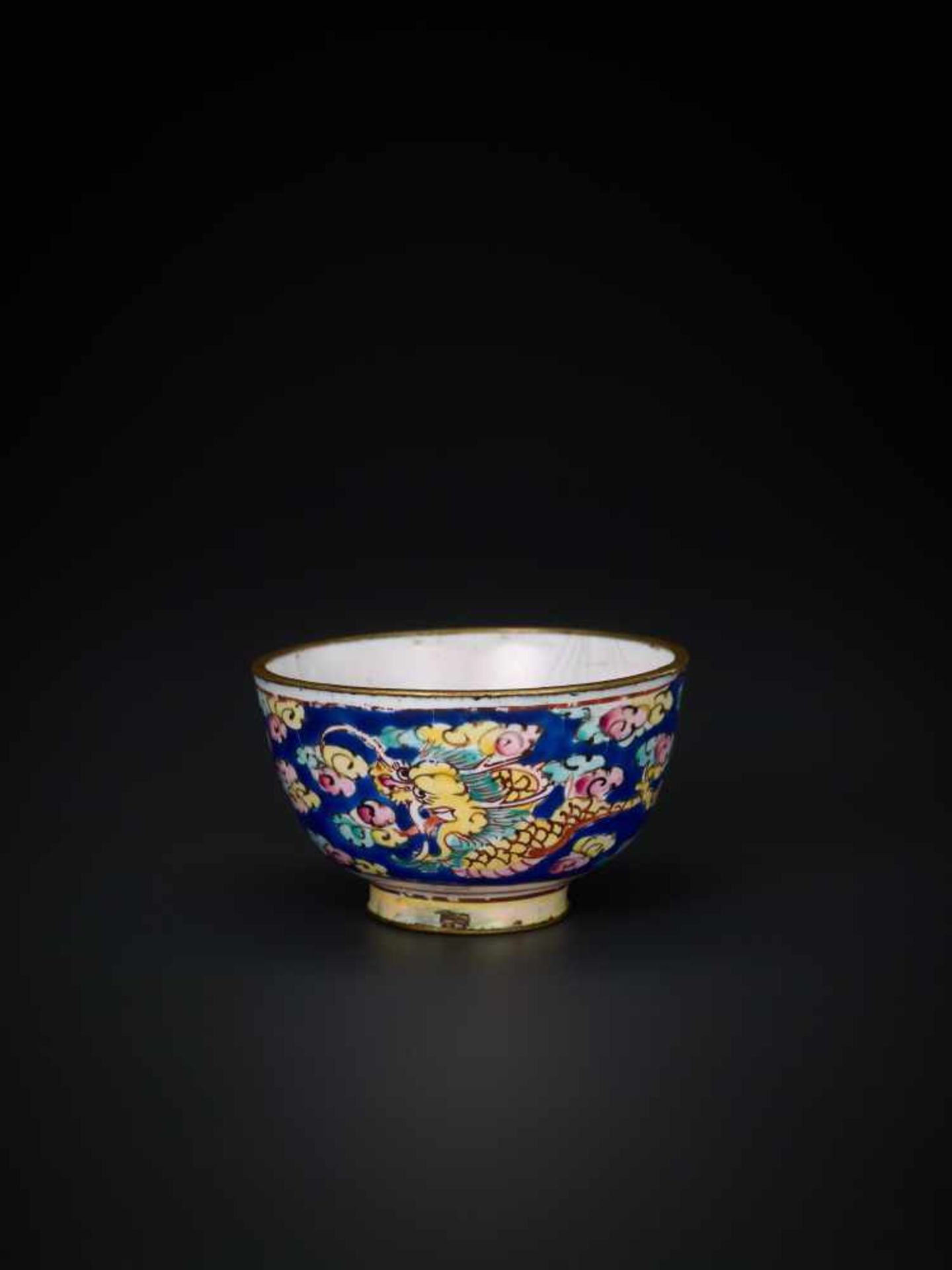 A QING DYNASTY CENTURY CANTON ENAMEL MINIATURE WINE CUP WITH DRAGON Enamel on bronze, multicolored