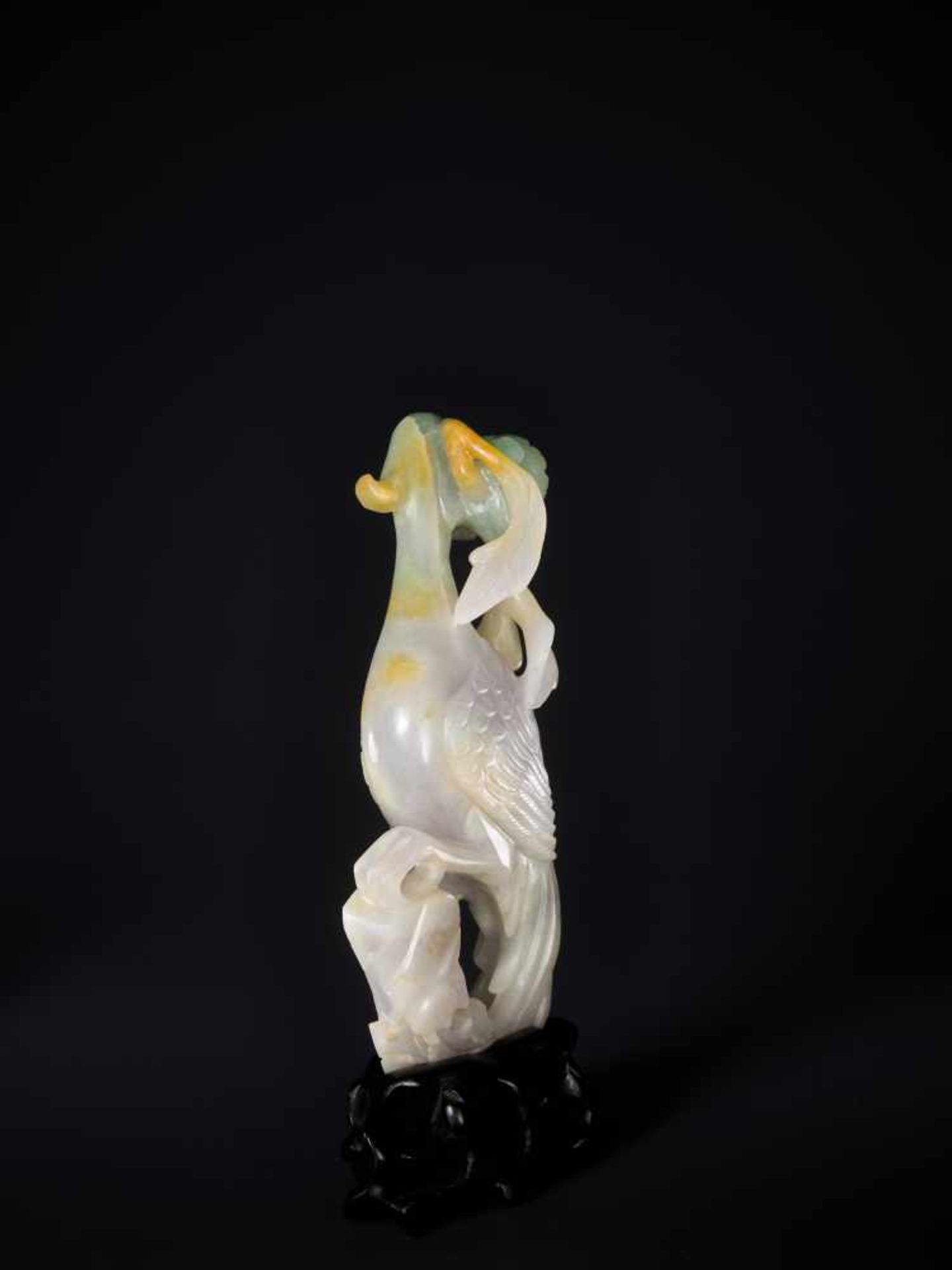 A JADEITE SCULPTURE OF A PHEONIX WITH PEONY, 1900s Jadeite in white, lilac, russet, and green hues - Image 4 of 6