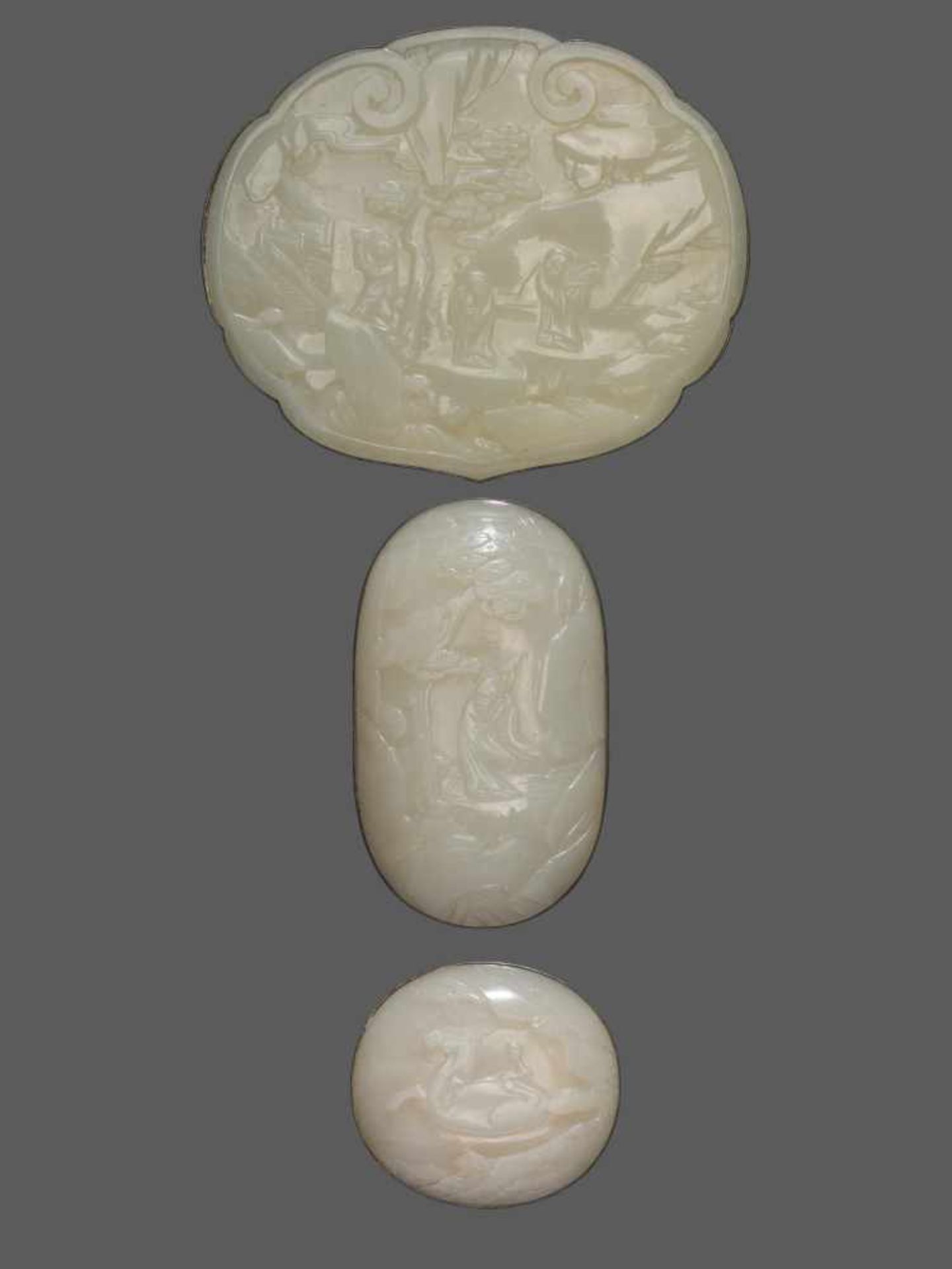 THREE WHITE JADE PLAQUES FOR RUYI SCEPTER, QING DYNASTY White jade with a slight pale celadon