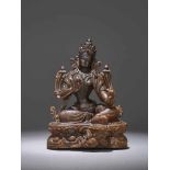 AN EXTREMELY RARE 17th CENTURY RHINOCEROS HORN CARVING OF A GREEN TARA This lot is published and