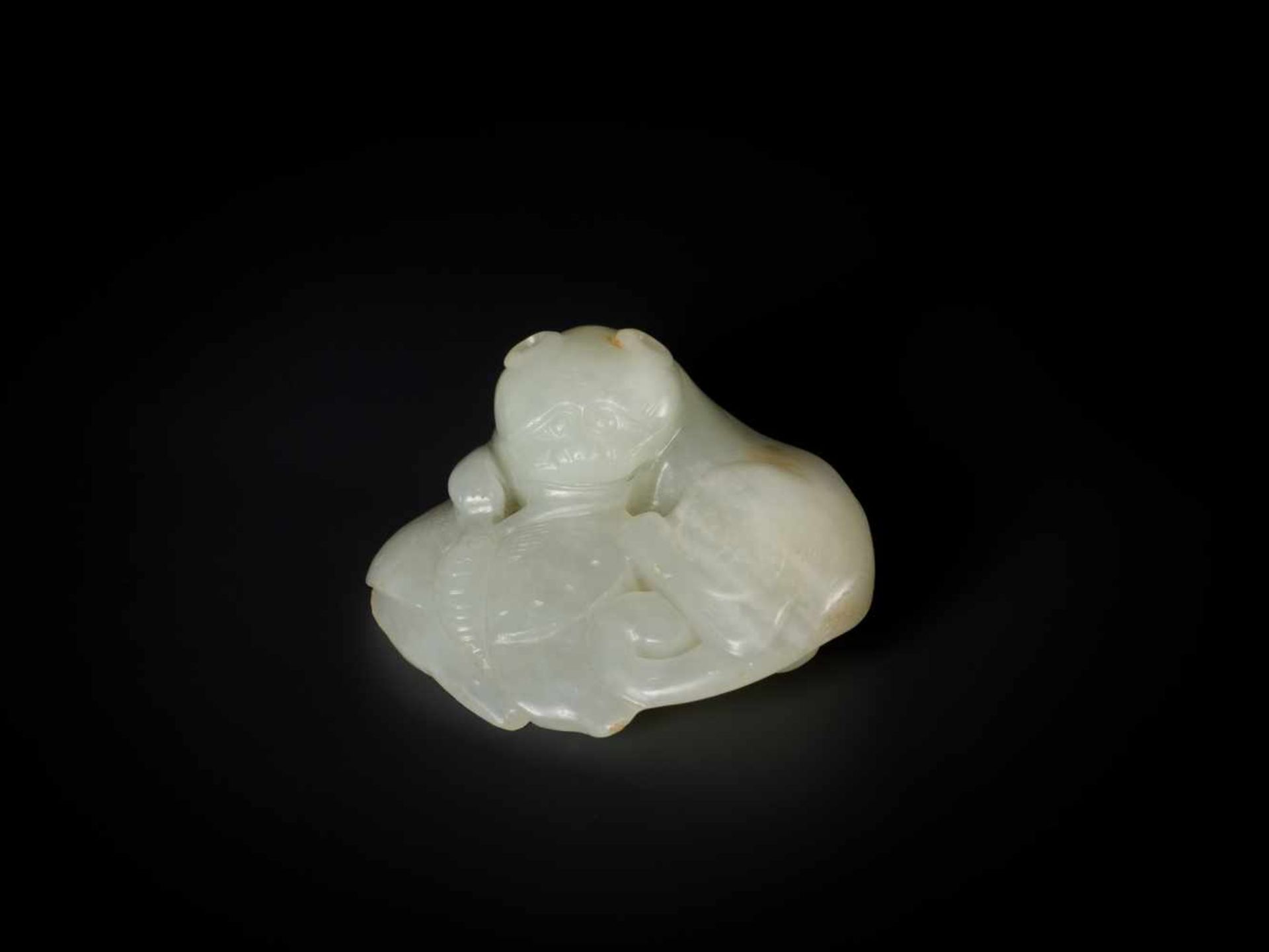 A QING DYNASTY PALE CELADON JADE ‘CAT AND BUTTERFLY’ GROUP Light celadon color jade with russet - Image 4 of 6