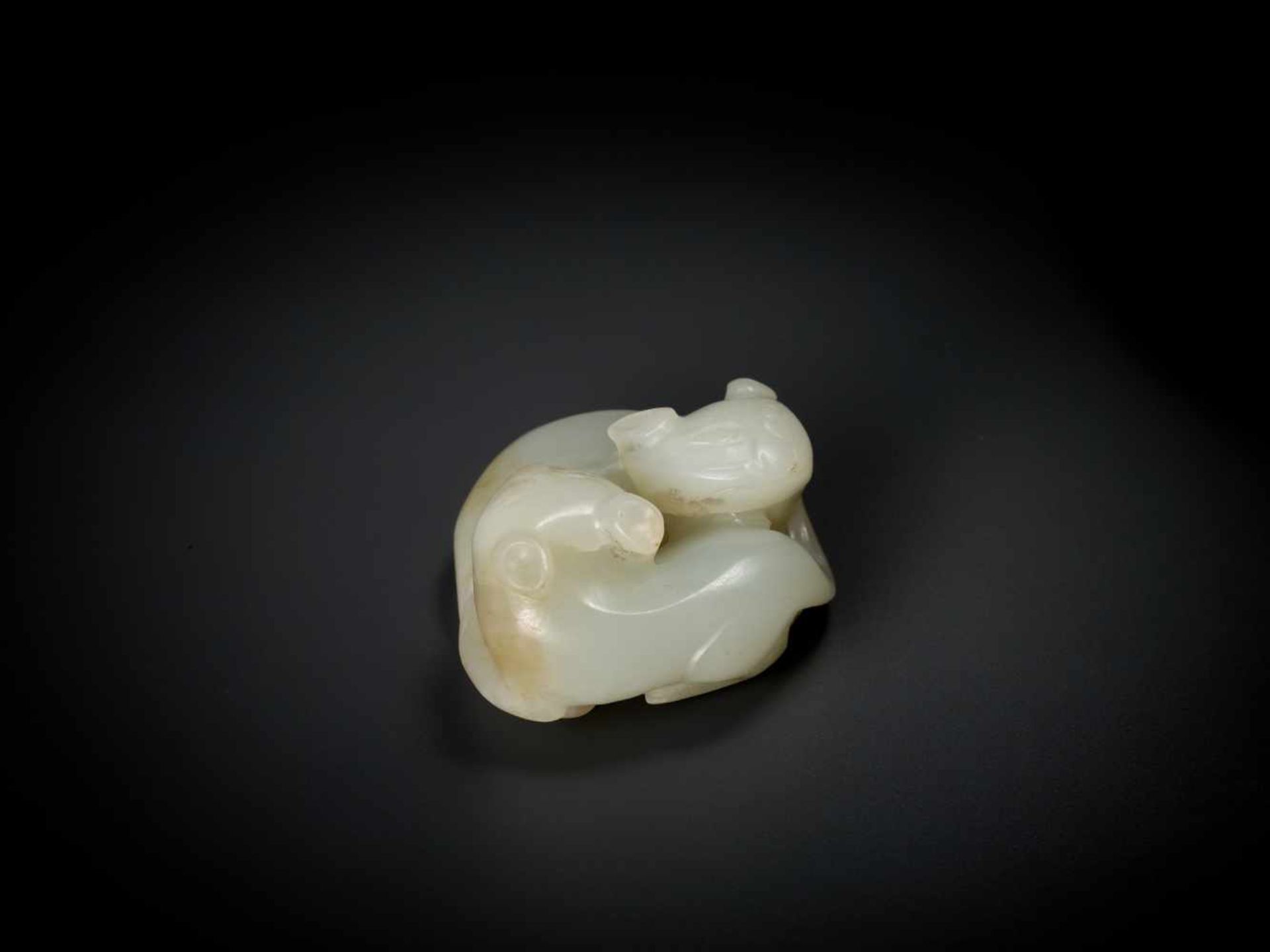 A QING DYNASTY PALE CELADON JADE CARVING OF TWO CATS Light celadon jade with ochre and milky white - Image 3 of 6