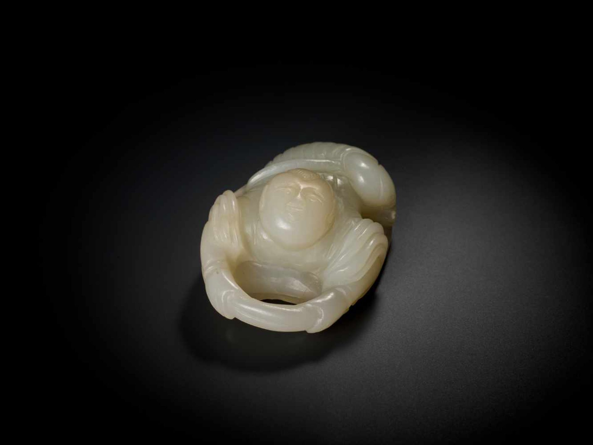 AN 18TH CENTURY JADE ‘BOY AND LOTUS’ CARVING Pale celadon jade of even color and translucent - Image 4 of 7