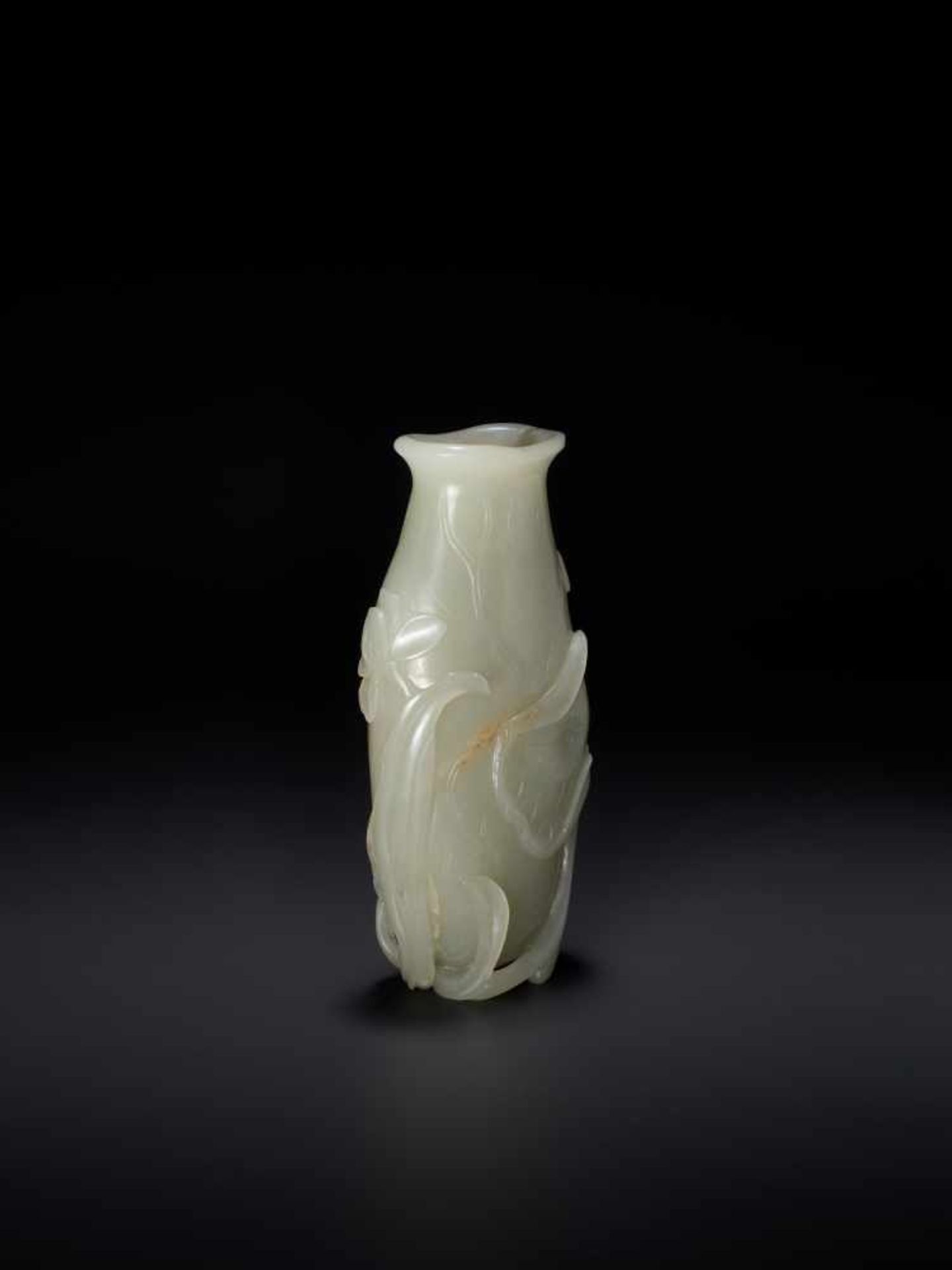 AN 18TH CENTURY CELADON AND RUSSET JADE LOTUS VASE Pale celadon with sparse russet inclusions, - Image 3 of 8