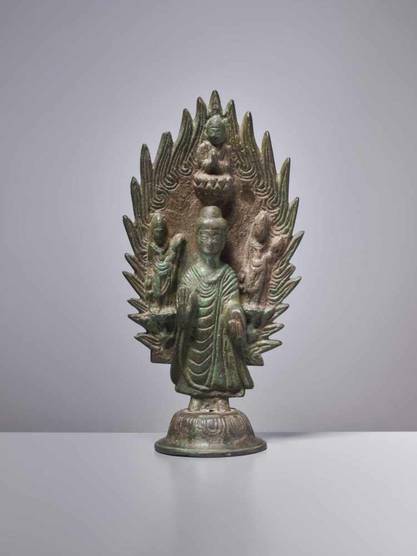 A BRONZE BUDDHA STANDING IN FRONT OF A FLAMING HALO, DATED 571 Cast and incised bronze with a rich - Image 2 of 7