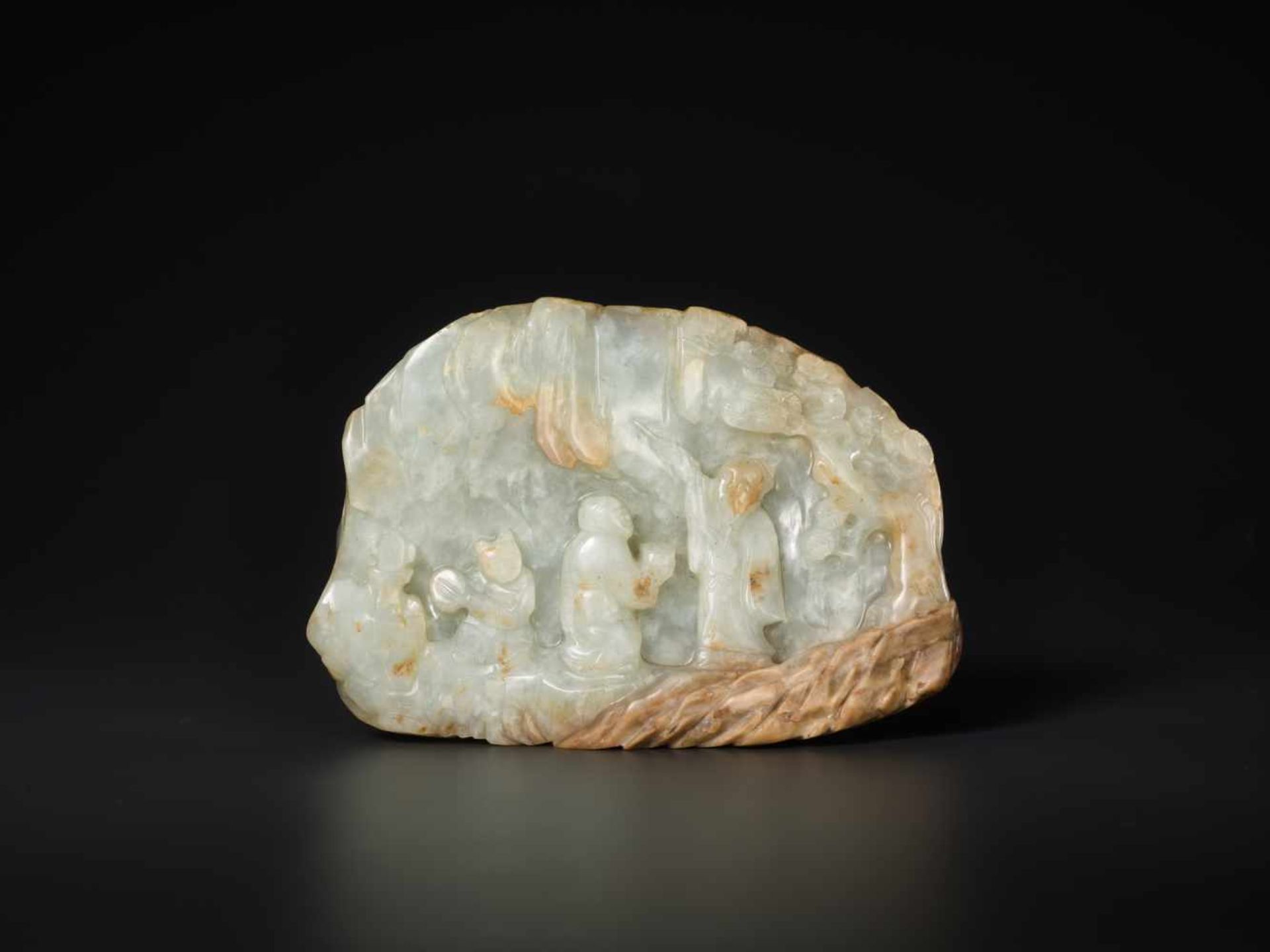 A FINE CELADON AND BROWN JADE MOUNTAIN BOULDER, QIANLONG Celadon jade with russet and opaque,