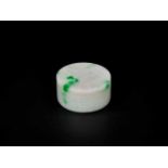 A WHITE & EMERALD GREEN JADEITE BOX AND COVER, QING DYNASTY Icy white jade with splashes of