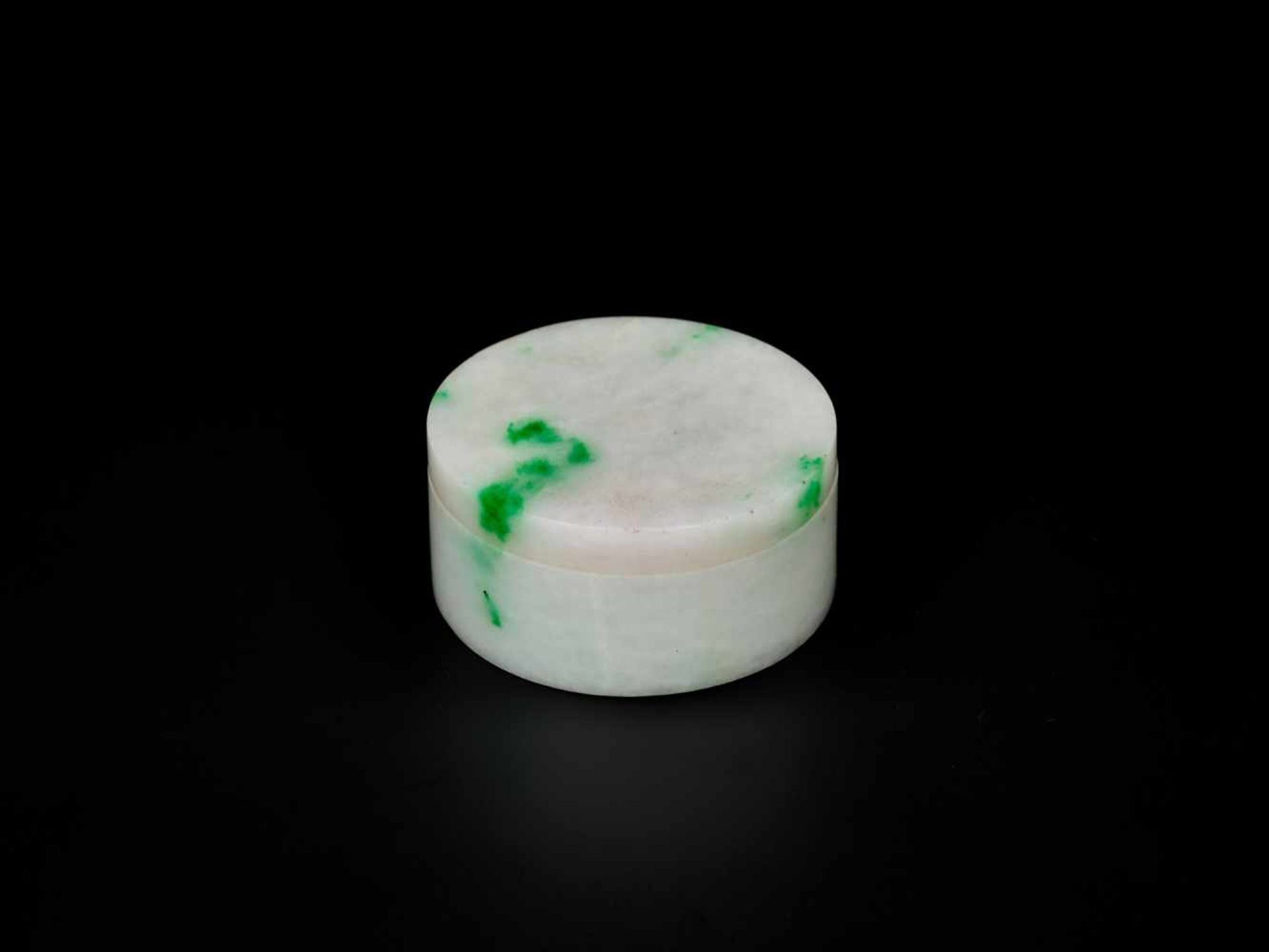 A WHITE & EMERALD GREEN JADEITE BOX AND COVER, QING DYNASTY Icy white jade with splashes of