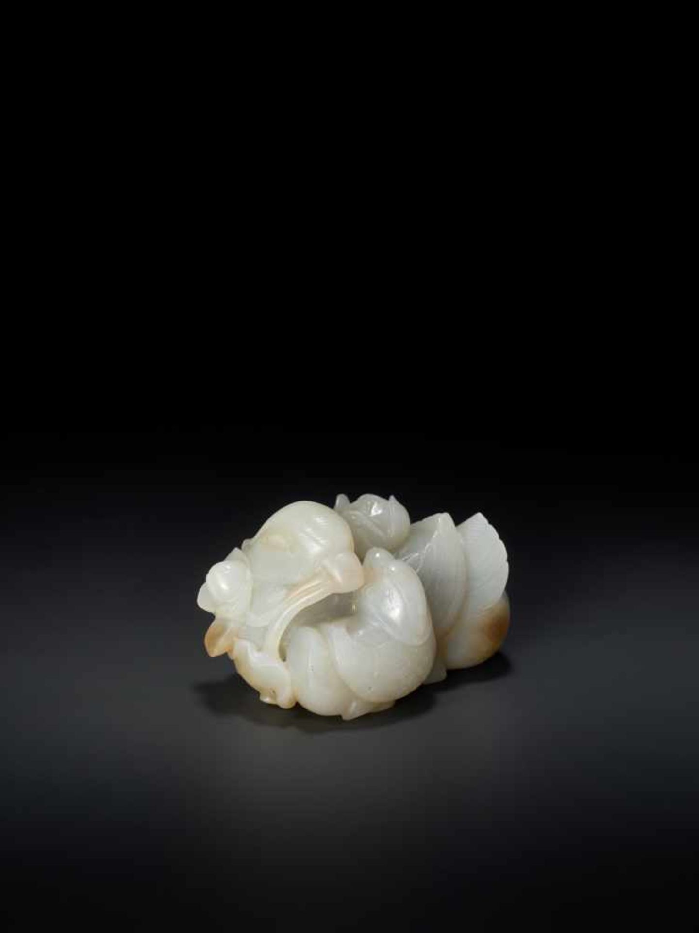 A QING DYNASTY CELADON AND RUSSET JADE ‘MANDARIN DUCKS AND LOTUS’ GROUP Light celadon color jade - Image 3 of 7