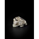 A MING DYNASTY MOTTLED JADE CARVING OF A RAM WITH LINGZHI Celadon, brown and black mottled jade,