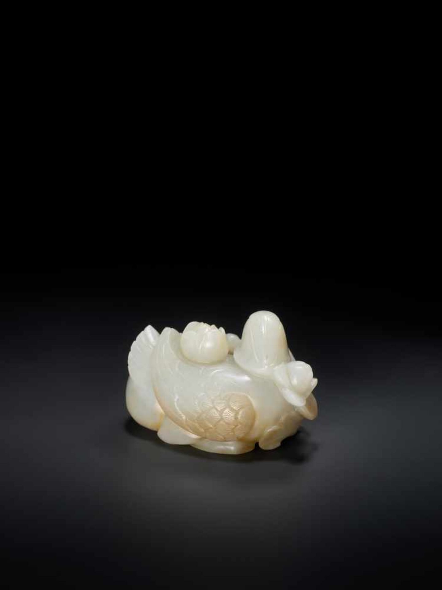 A QING DYNASTY CELADON AND RUSSET JADE ‘MANDARIN DUCKS AND LOTUS’ GROUP Light celadon color jade - Image 2 of 7