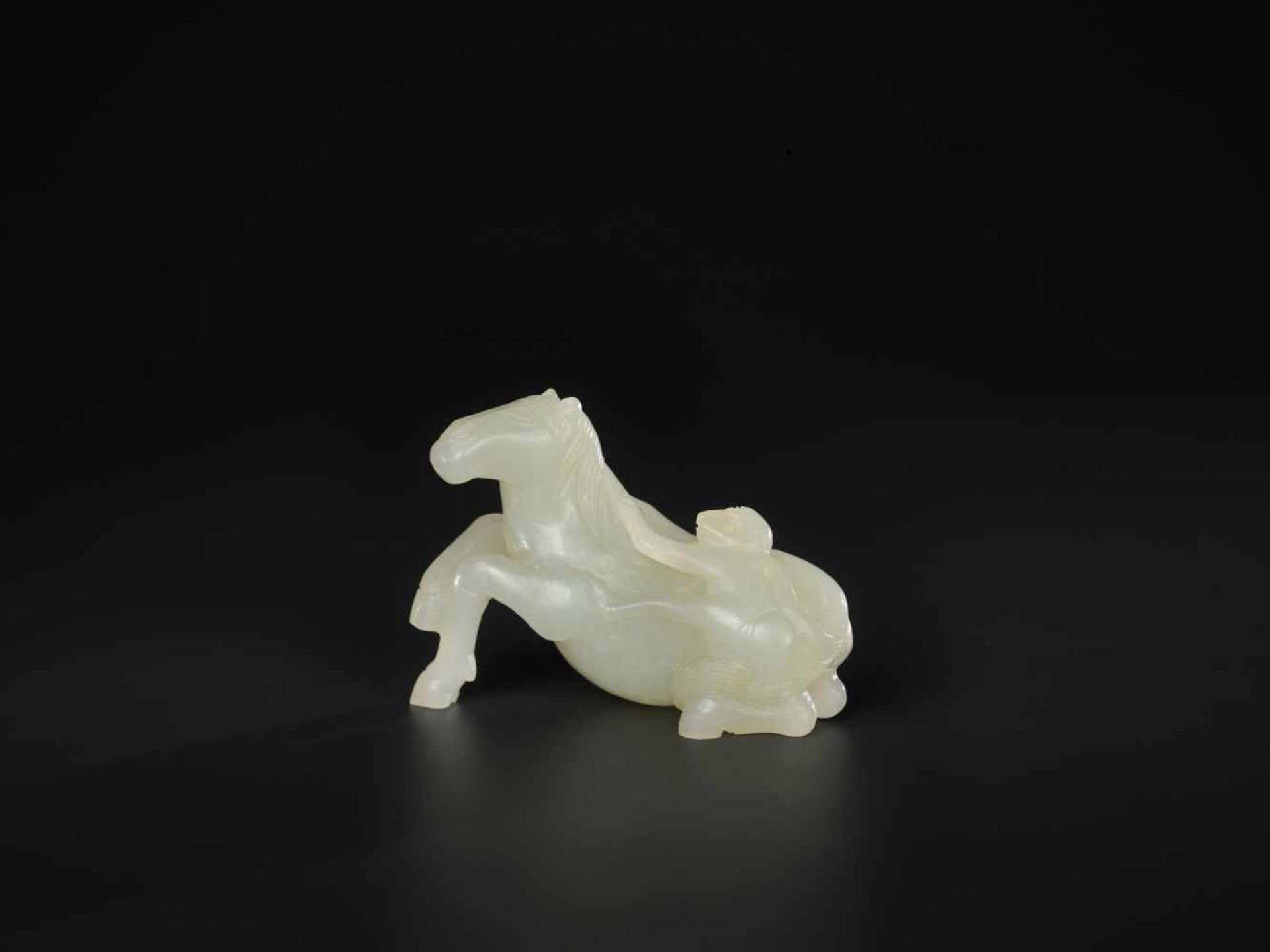 A PALE CELADON 'HORSE AND MONKEY' JADE CARVING, QING DYNASTY, 18TH / 19TH CENTURY The stone of even, - Image 3 of 7