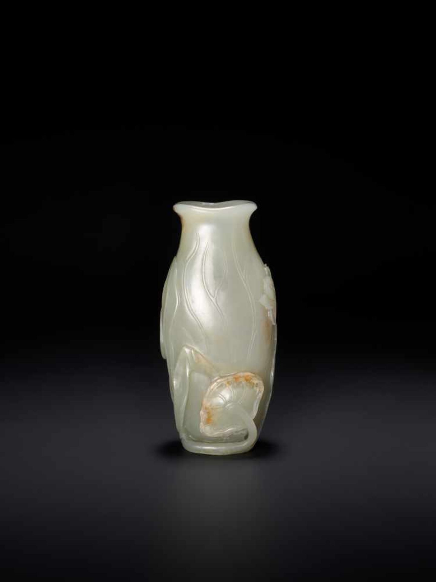 AN 18TH CENTURY CELADON AND RUSSET JADE LOTUS VASE Pale celadon with sparse russet inclusions, - Image 2 of 8