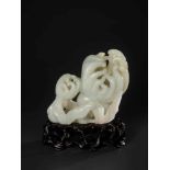 A SUPERBLY CARVED WHITE JADE GROUP OF FINGER CITRONS, QING DYNASTY, 18TH CENTURY White jade of