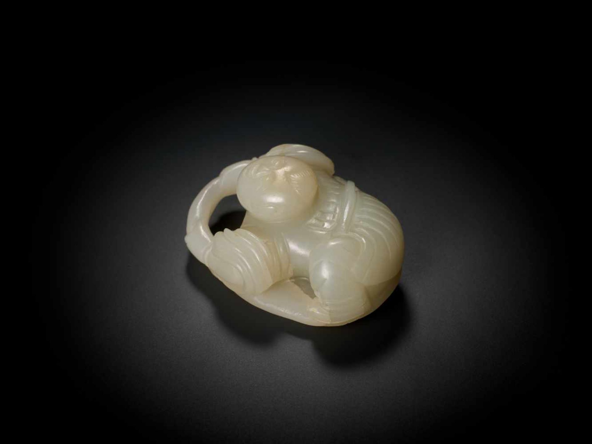 AN 18TH CENTURY JADE ‘BOY AND LOTUS’ CARVING Pale celadon jade of even color and translucent - Image 6 of 7