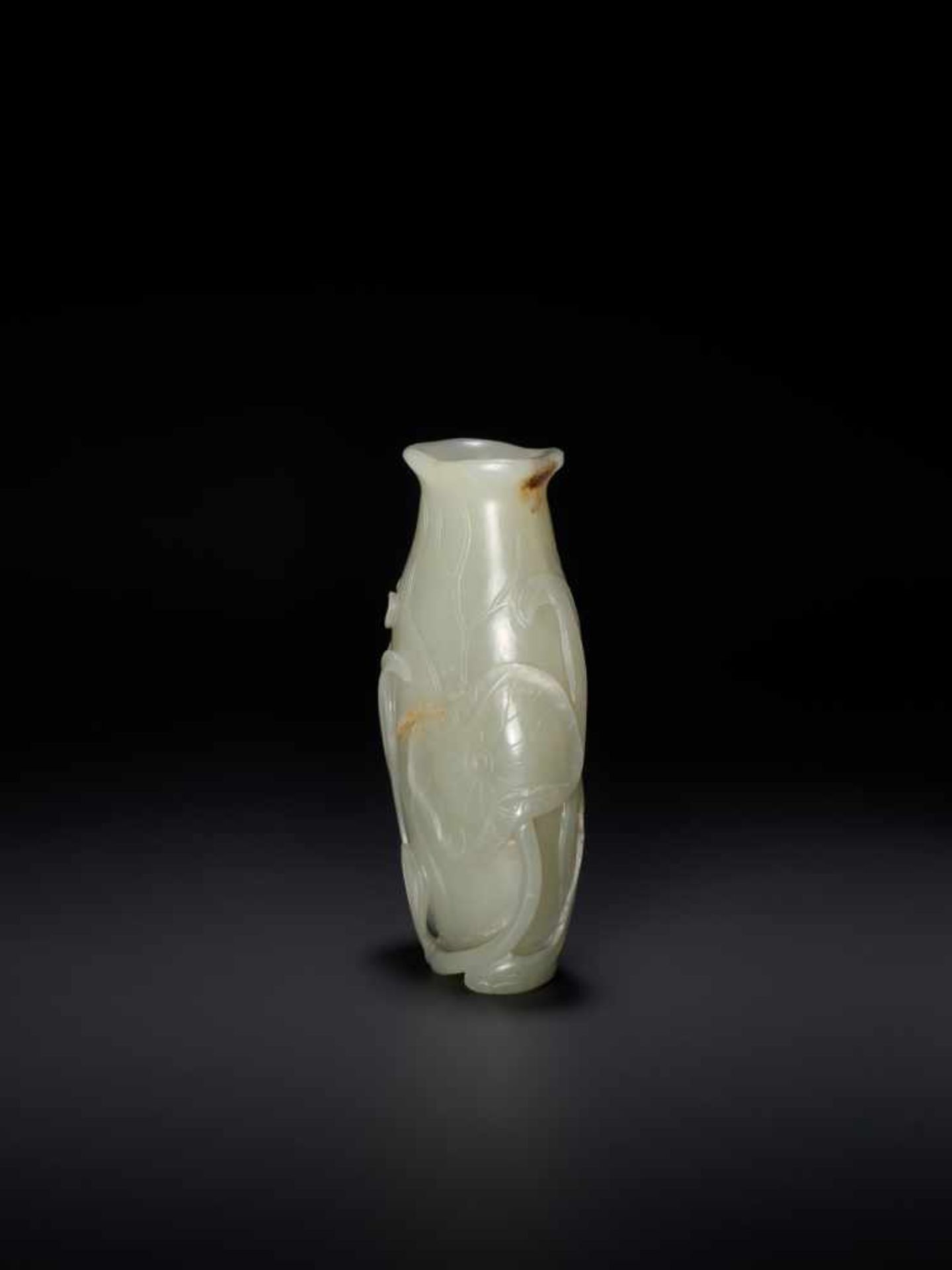 AN 18TH CENTURY CELADON AND RUSSET JADE LOTUS VASE Pale celadon with sparse russet inclusions, - Image 5 of 8