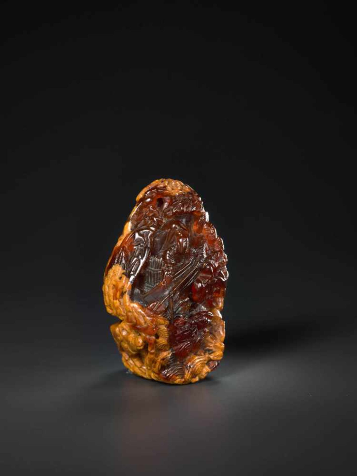 AN 18th CENTURY AMBER PEBBLE CARVING ‘VILLAGE LIFE’ Amber of deep red and caramel color, opaque - Image 5 of 8