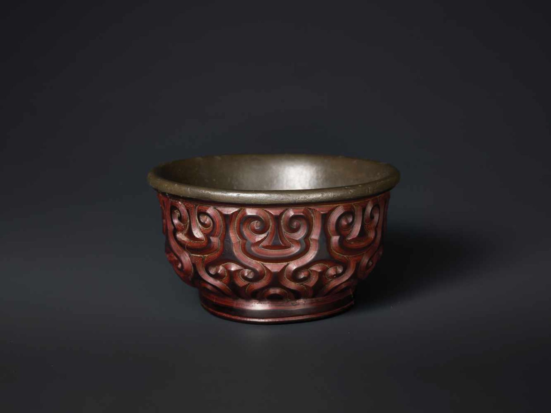A SONG DYNASTY TIXI LACQUER BOWL WITH PEWTER LINING Multi-layered lacquer, interior lined with