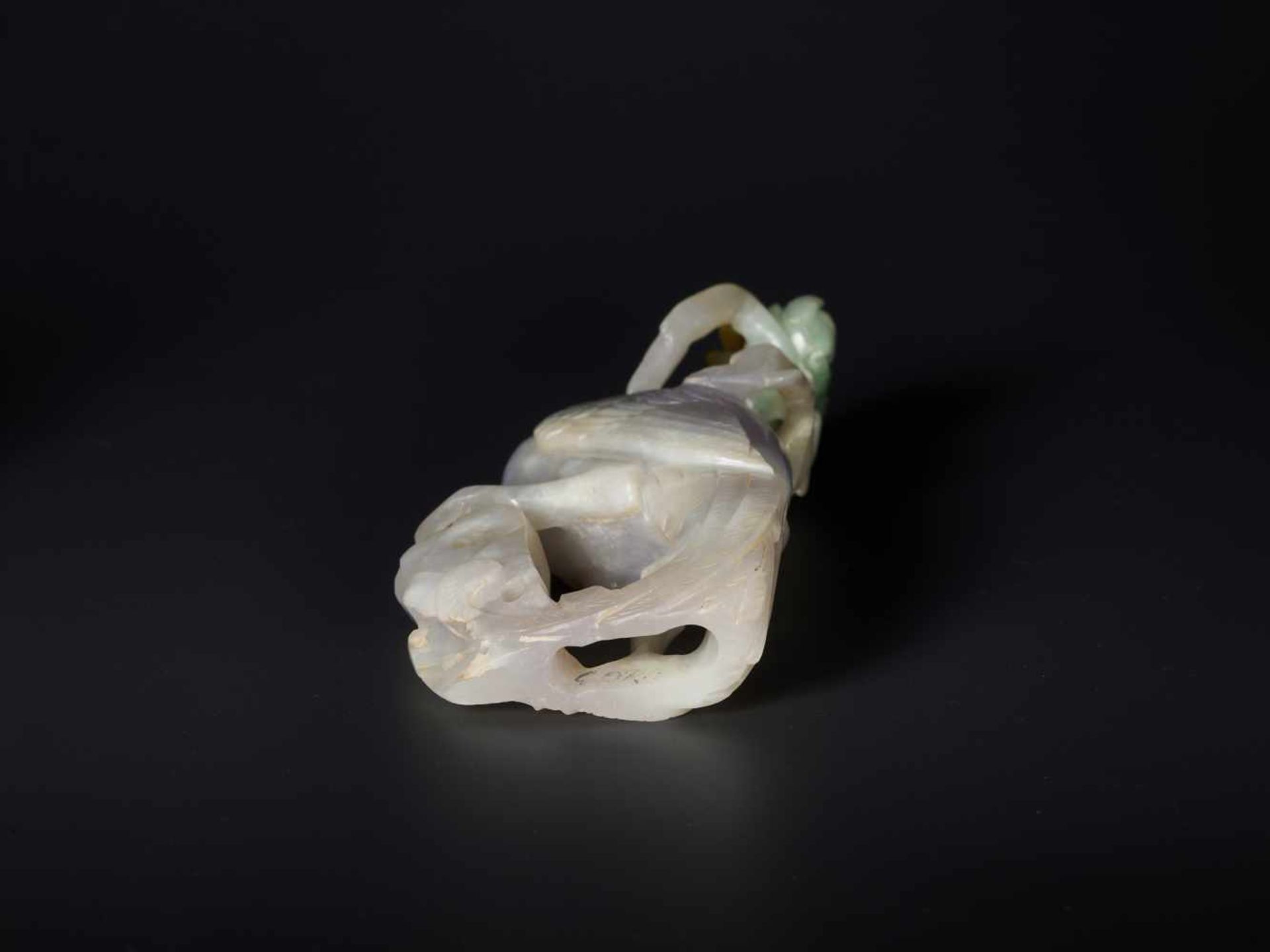 A JADEITE SCULPTURE OF A PHEONIX WITH PEONY, 1900s Jadeite in white, lilac, russet, and green hues - Image 5 of 6