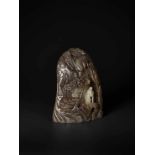 A LARGE BROWN, CELADON AND WHITE JADE MOUNTAIN BOULDER, QING DYNASTY Celadon and brown jade with