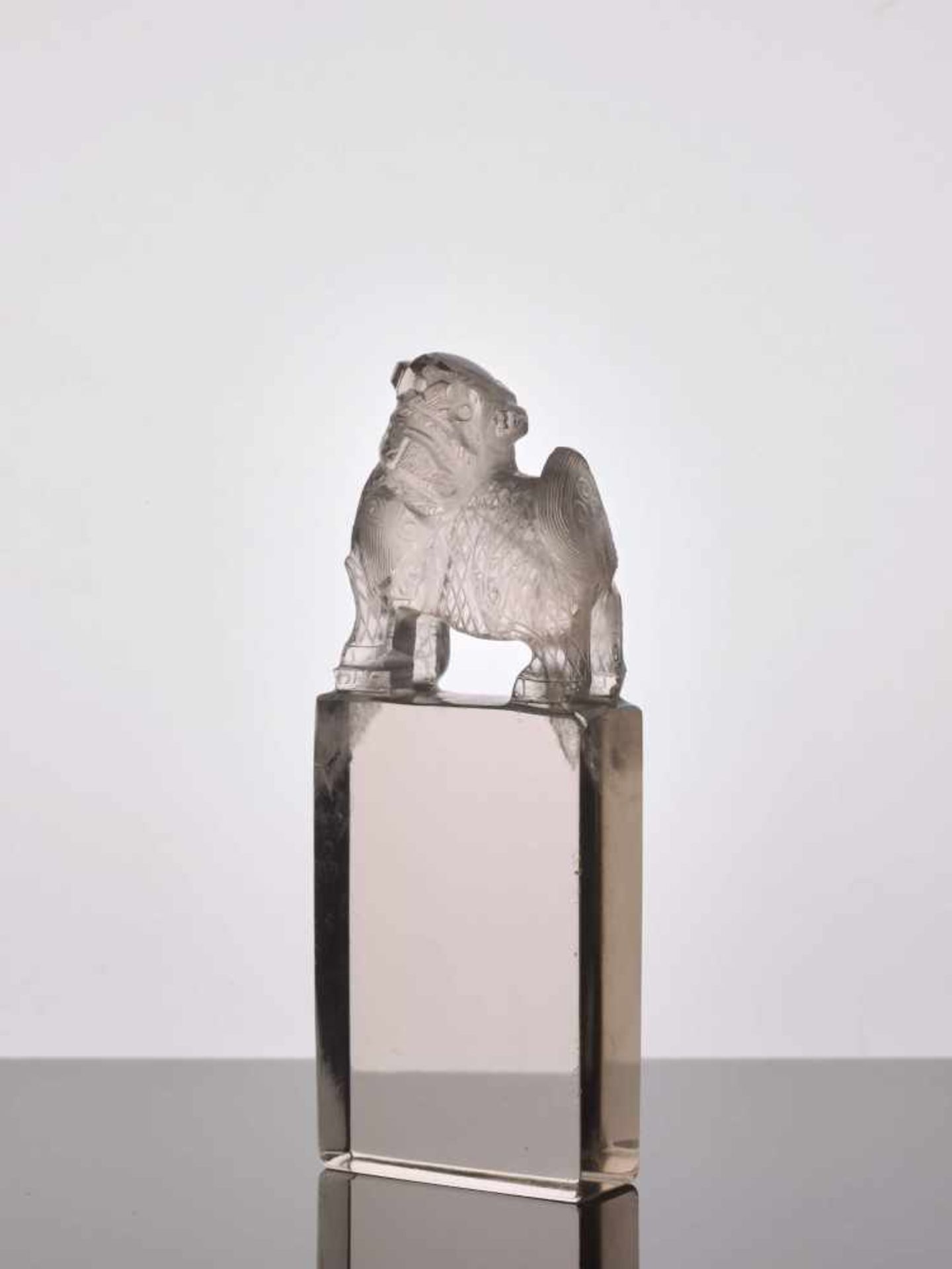 A QING DYNASTY ROCK CRYSTAL LITERATI SEAL 'GUARDIAN LION' Transparent rock crystal with natural