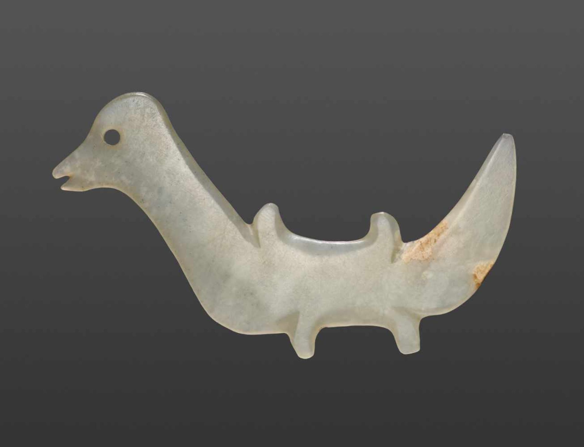 A LOVELY, EXTREMELY THIN BIRD IN TRANSLUCENT LIGHT GREEN JADE Jade. China, Late Neolithic, late