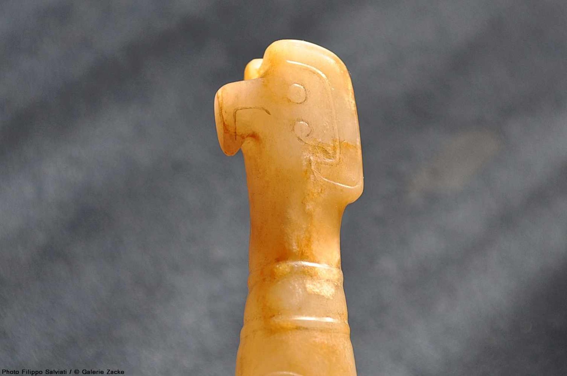 AN EXQUISITE FINIAL IN WHITE JADE CARVED AS AN ELONGATED BIRD IN PROFILE Jade. China, Late Shang - Image 9 of 11