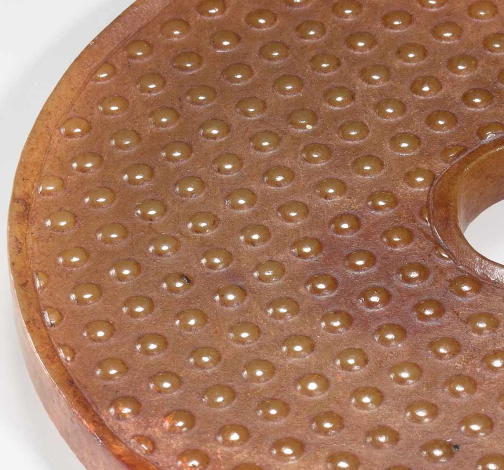 AN ATTRACTIVE AMBER COLOURED BI DISC WITH A PATTERN OF RAISED BOSSES Jade. China, Han Dynasty, 2nd - - Image 6 of 8