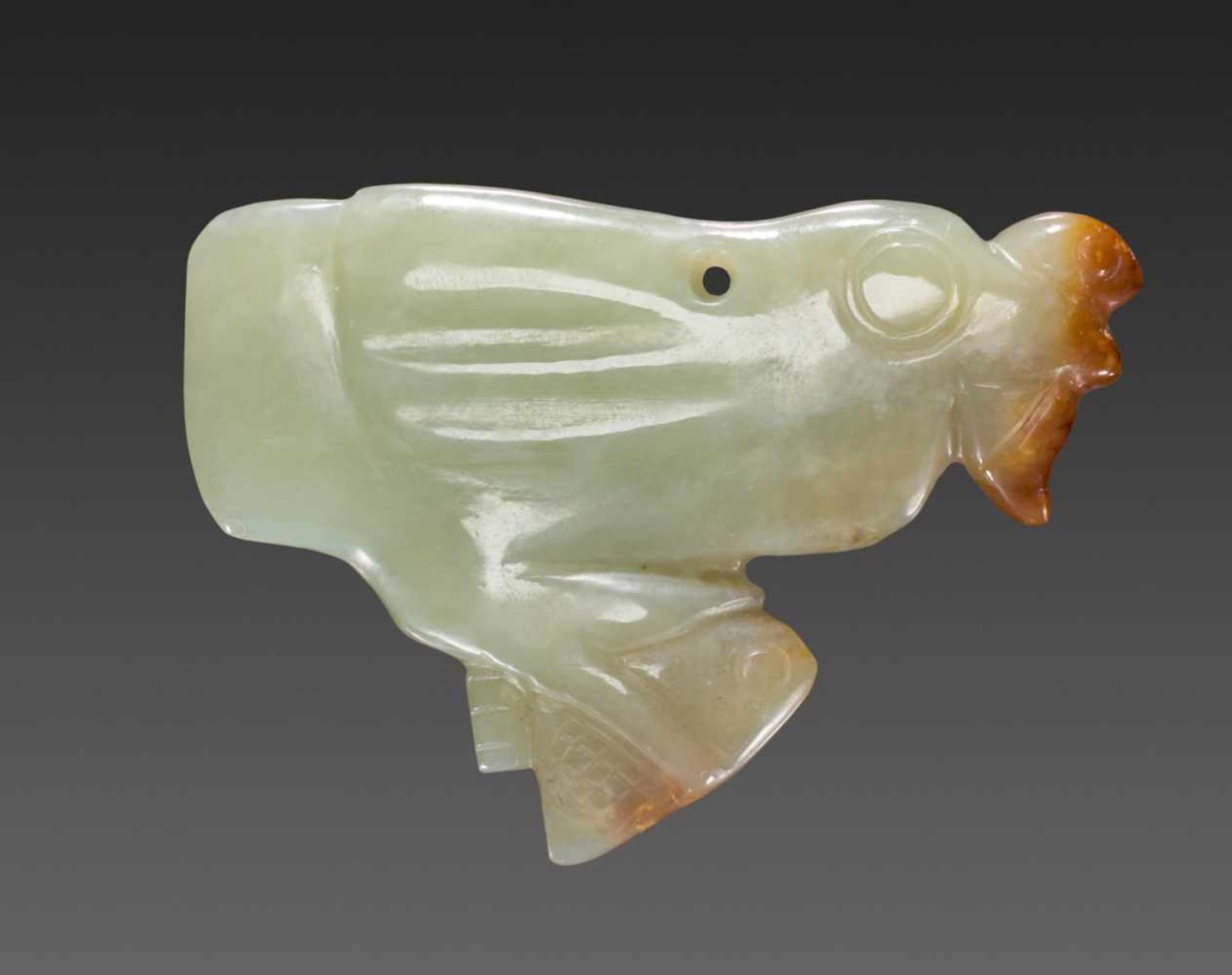 A DELIGHFUL LIGHT GREEN JADE BIRD HOLDING TWO FISH Jade. China, Late Shang, Early Western Zhou, c. - Image 2 of 5