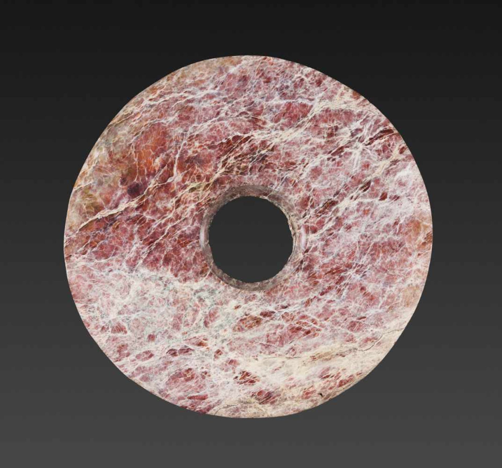 AN AMAZING NEOLITHIC BI DISC IN REDDISH JADE WITH INTRICATE NATURAL VEINING Jade. China, Late - Image 2 of 9