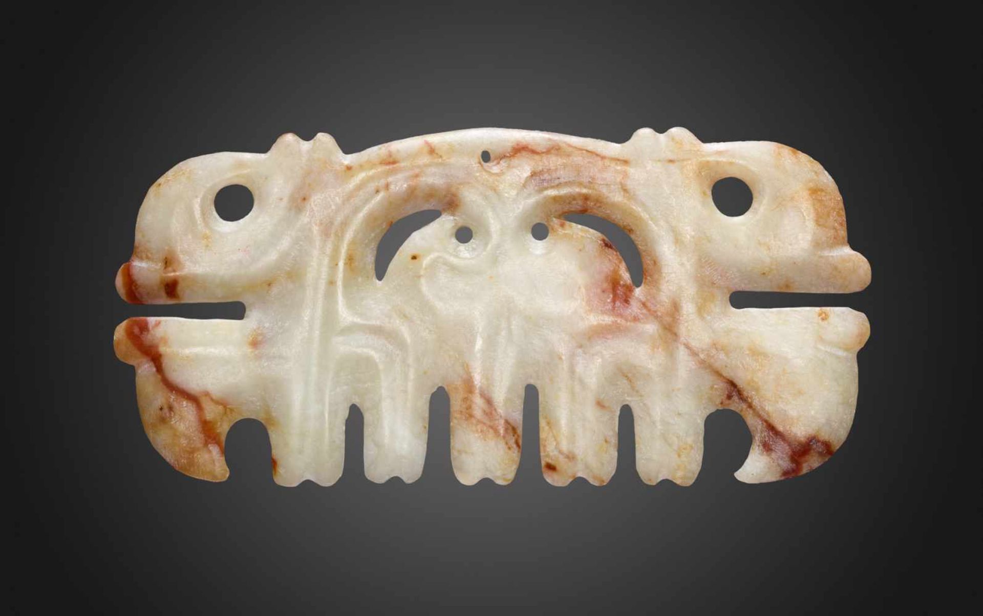 AN IMPOSING HONGSHAN “TOOTHED” ORNAMENT WITH MASK MOTIF Jade. China, Late Neolithic period, Hongshan