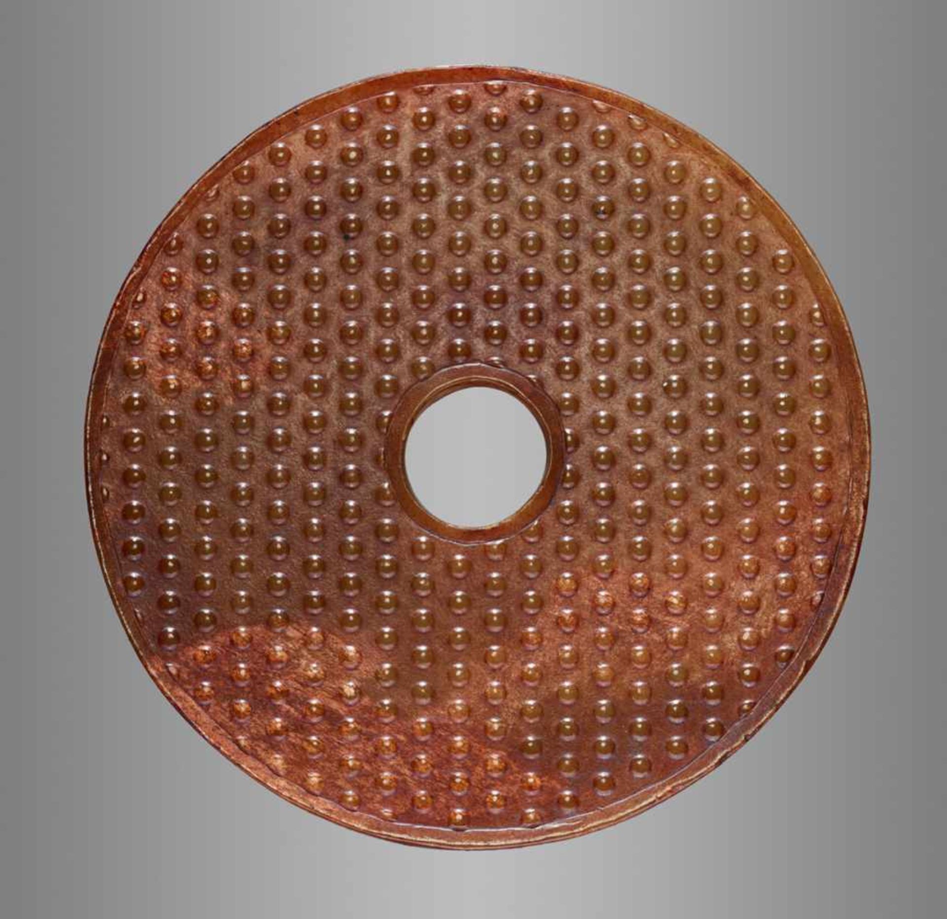 AN ATTRACTIVE AMBER COLOURED BI DISC WITH A PATTERN OF RAISED BOSSES Jade. China, Han Dynasty, 2nd - - Image 3 of 8