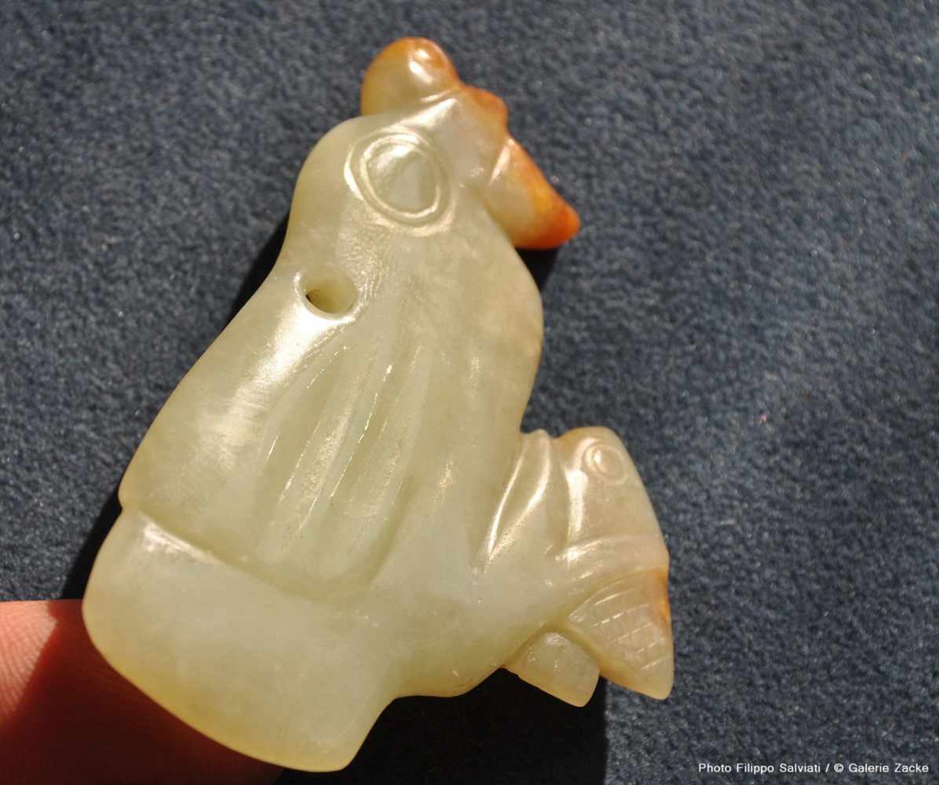 A DELIGHFUL LIGHT GREEN JADE BIRD HOLDING TWO FISH Jade. China, Late Shang, Early Western Zhou, c. - Image 3 of 5