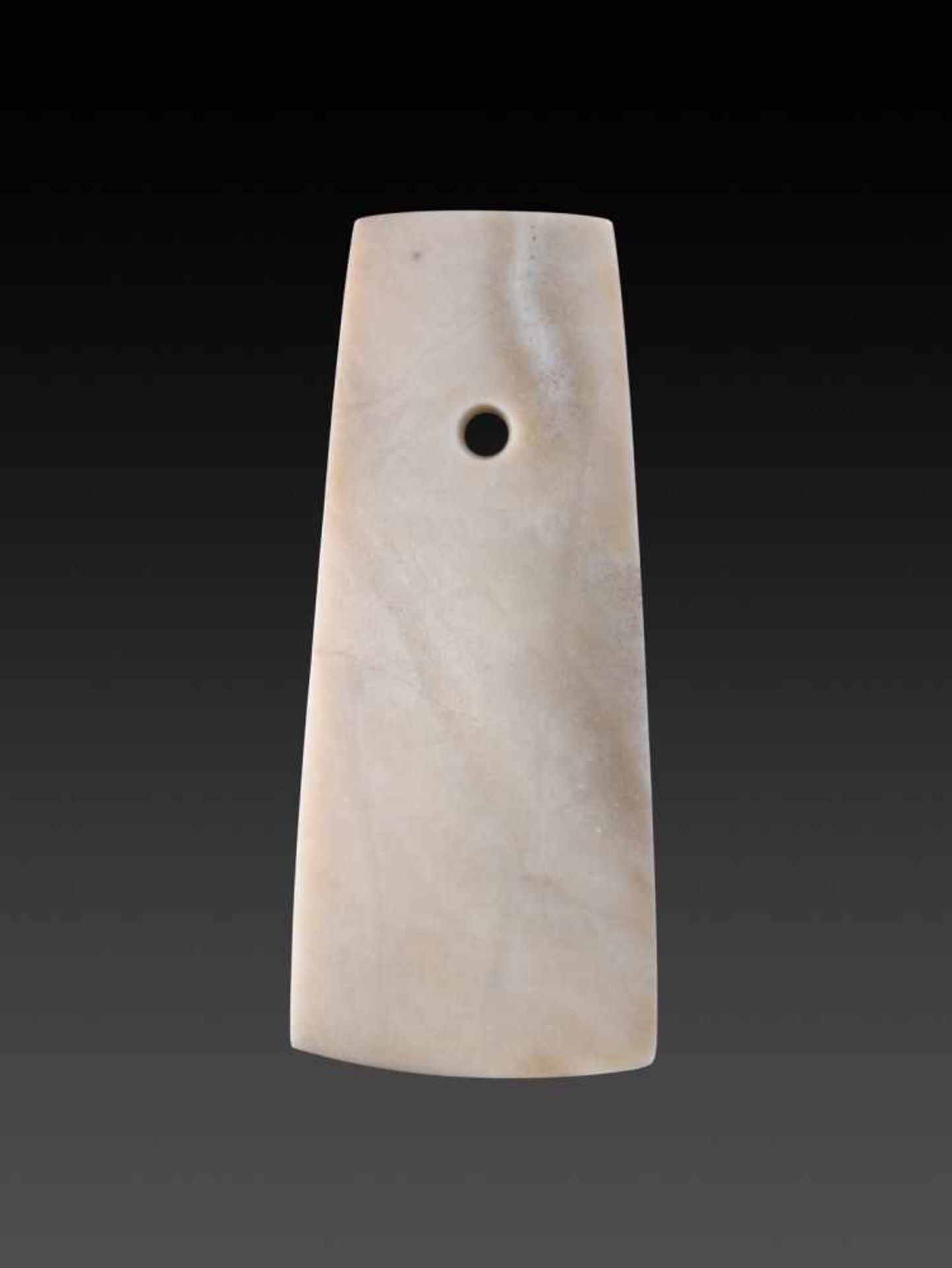 A SMOOTH AND ATTRACTIVE QIJIA CULTURE BLADE OF TRAPEZOIDAL FORM IN WHITE JADE Jade. China, Early - Image 3 of 7