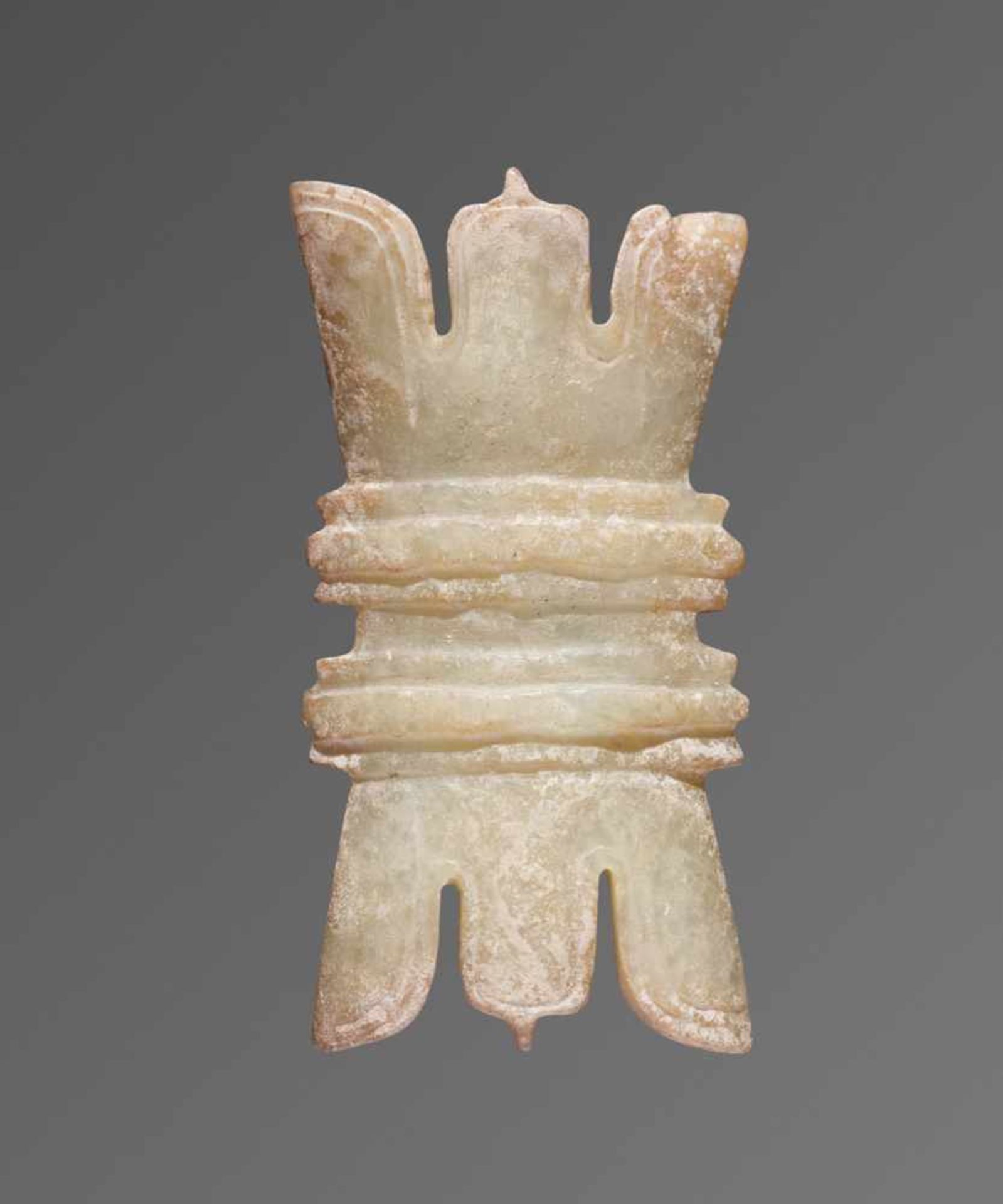 AN INTRIGUING SMALL JADE ORNAMENT SHAPED AS A “TIED BUNDLE” (SHUJUAN) Jade. China, Late Western