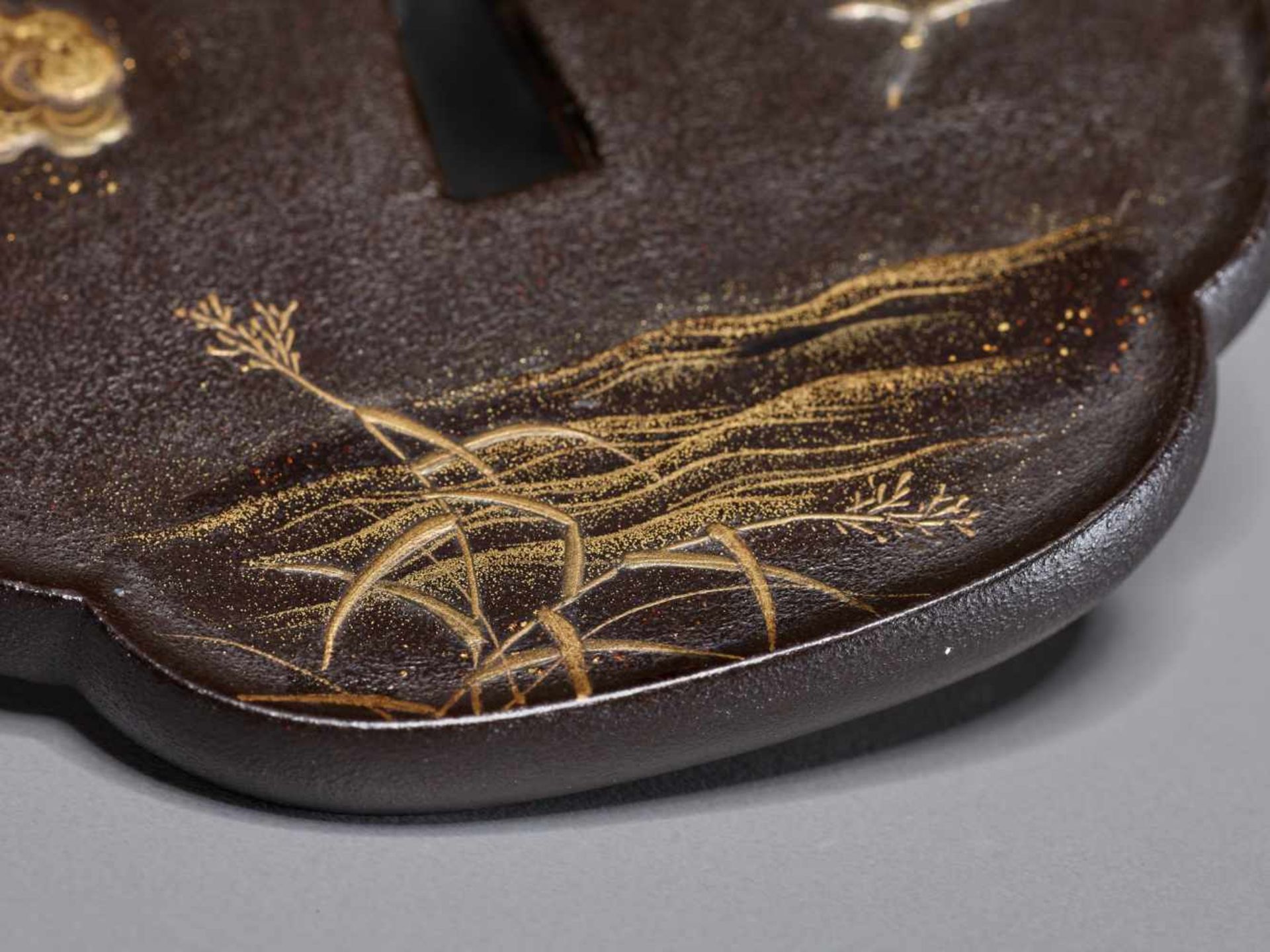 A RARE LACQUERED TSUBA WITH FULL MOON AND GEESE BY YAMADA TSUNEYOSHI Lacquered woodJapan, Edo period - Image 4 of 9