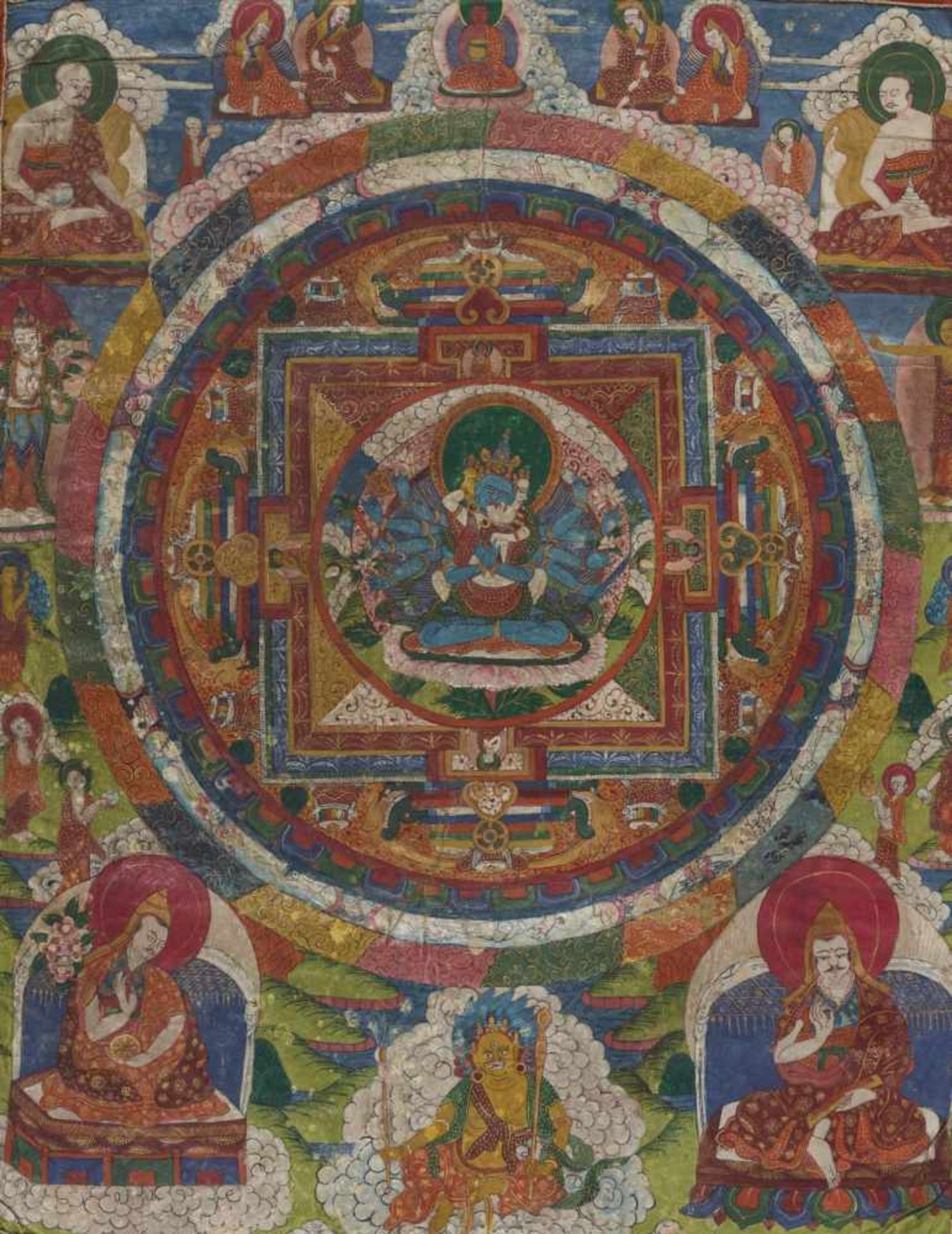 A FIGURE FILLED MANDALA THANGKA WITH CHAKRASAMVARA IN YAB YUM Distemper and gold paint on cloth,