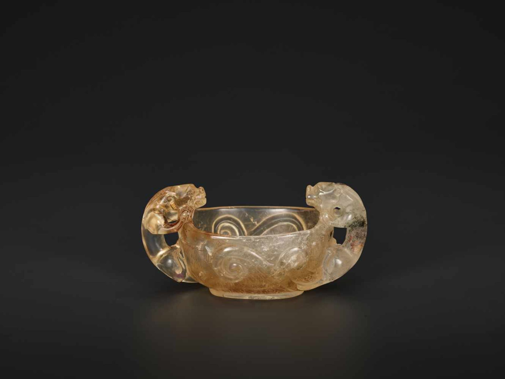 A SMALL ROCK CRYSTAL ‘CHILONG’ BRUSH WASHER IN LIBATION CUP SHAPE, 18TH CENTURY Transparent rock