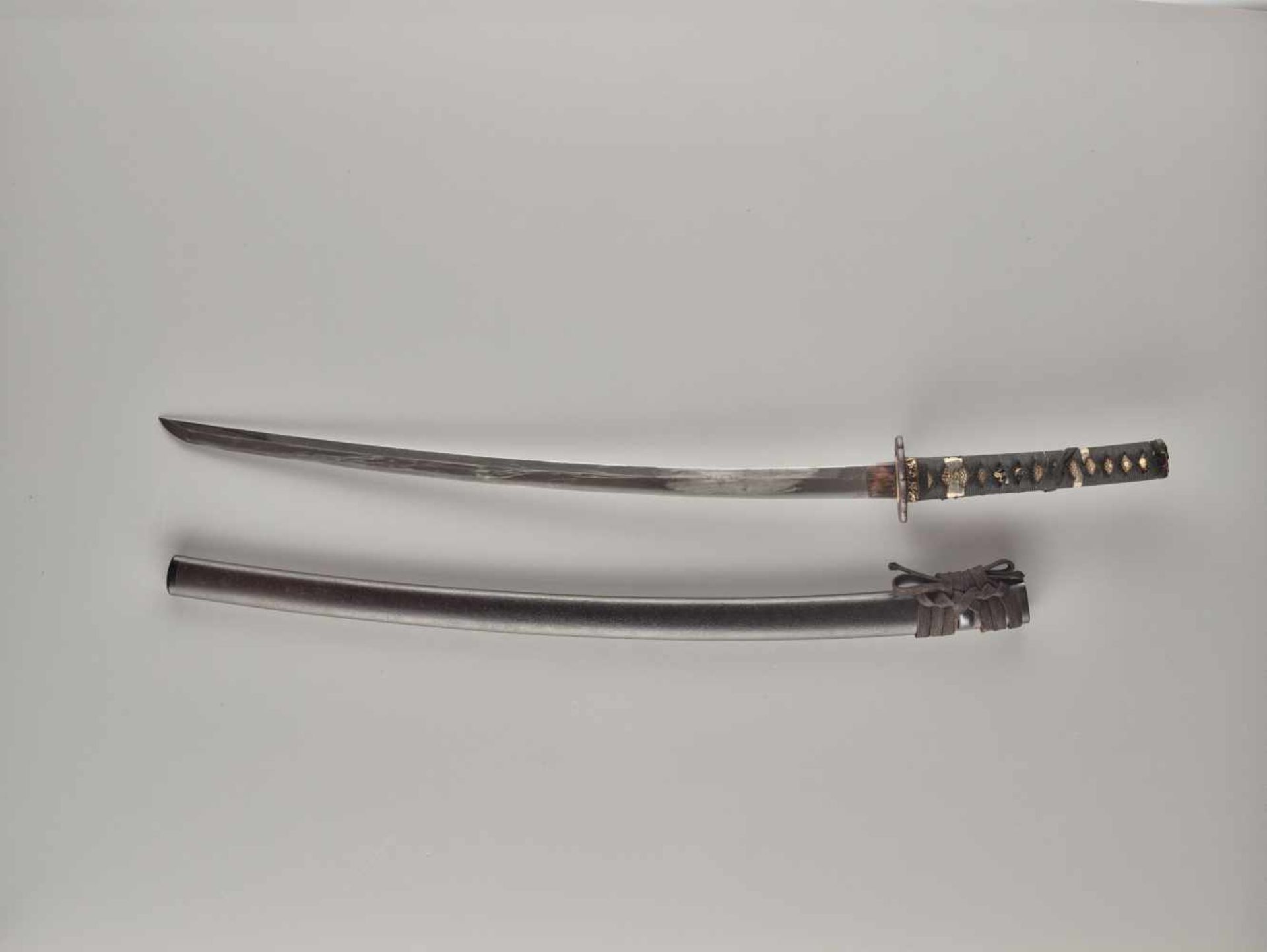 A KATANA Japan, mid-Edo period (1603 - 1868) (blade); c. 18th century (koshirae)BladeShinogi tsukuri