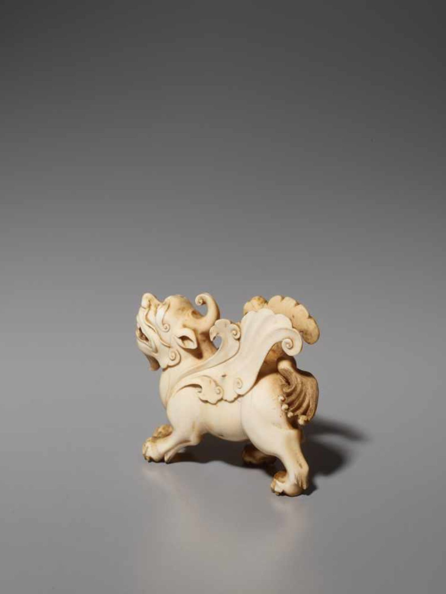 AN IVORY CARVING OF A MYTHICAL BEAST, BIXIE, QING DYNASTY Carved and incised elephant ivory with a - Image 6 of 9