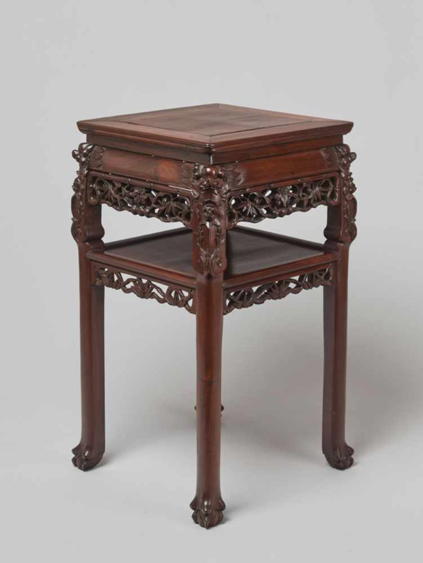 A FINELY CARVED SQUARE WOODEN TWO-STOREY HIGH TABLE, QING DYNASTY Made of several jointed pieces